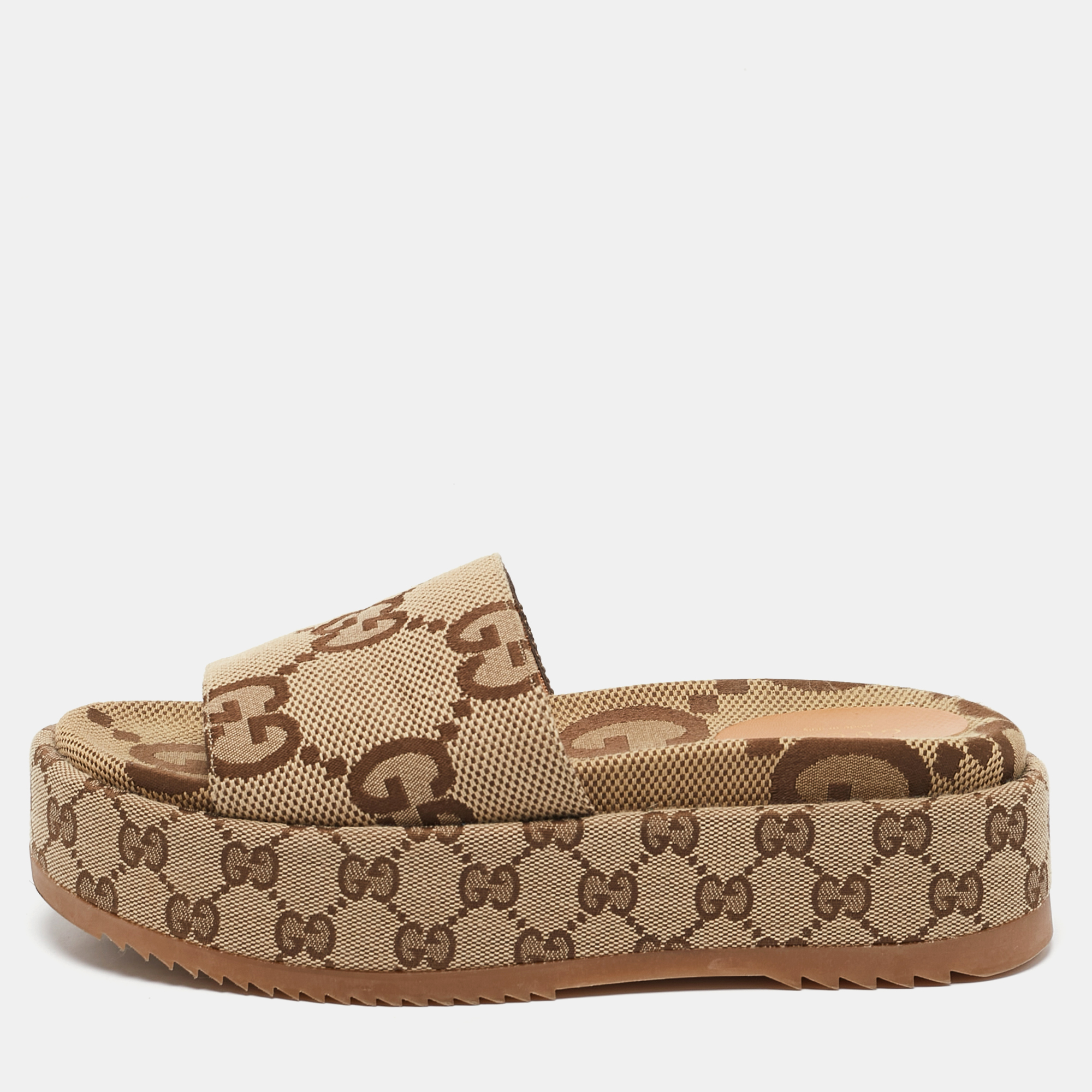 

Gucci Beige Jumbo GG Canvas Platform Slides Size