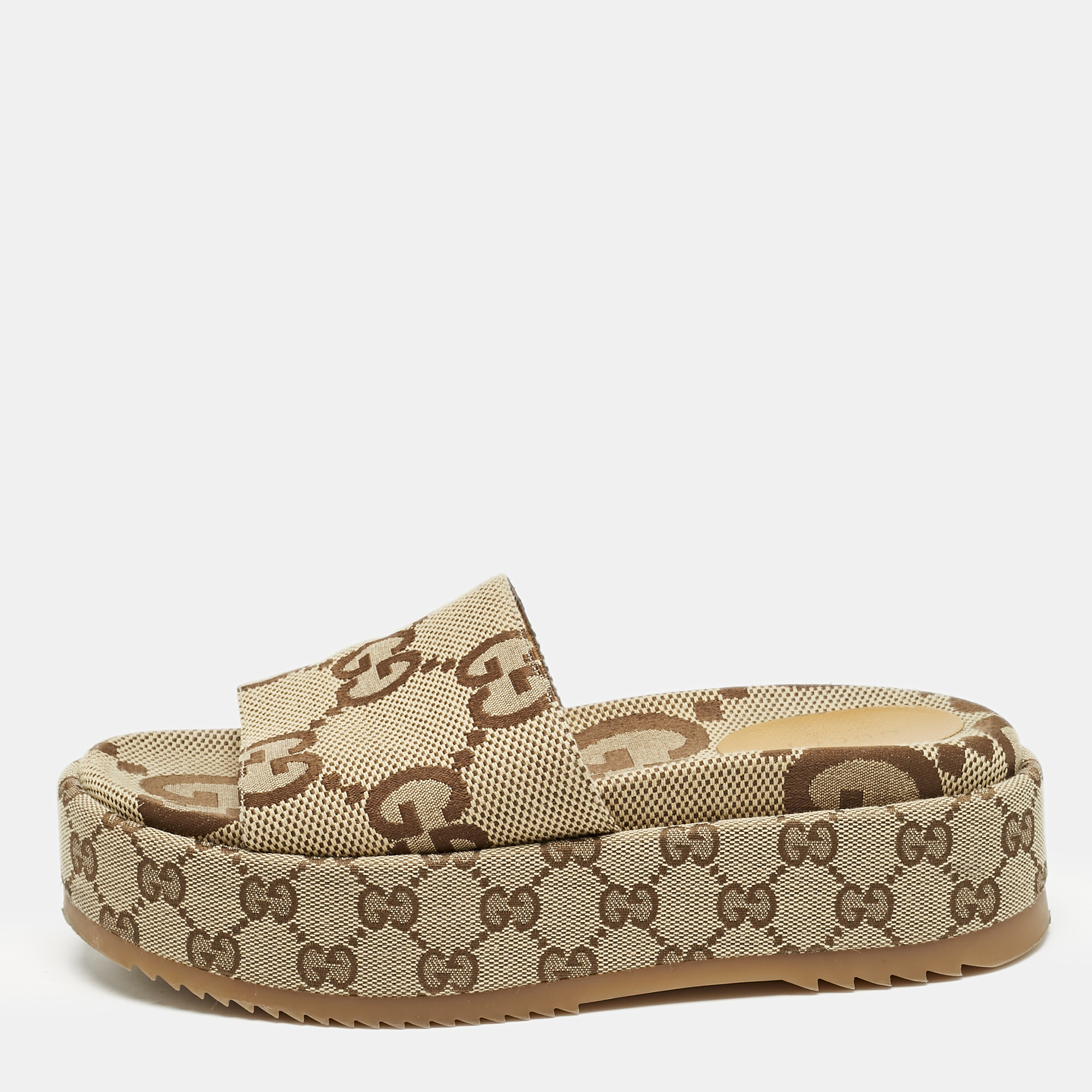 

Gucci Beige Jumbo GG Canvas Platform Slides Size