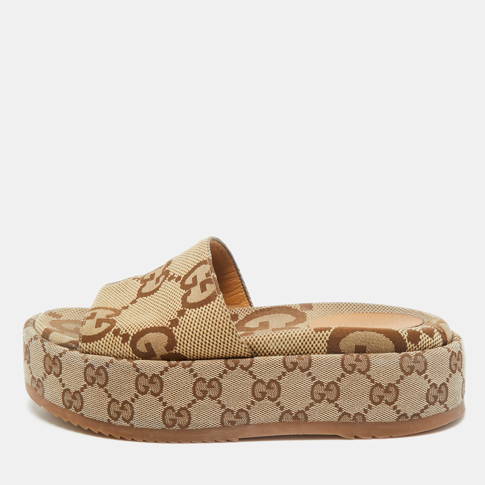 

Gucci Beige Jumbo GG Canvas Platform Slides Size