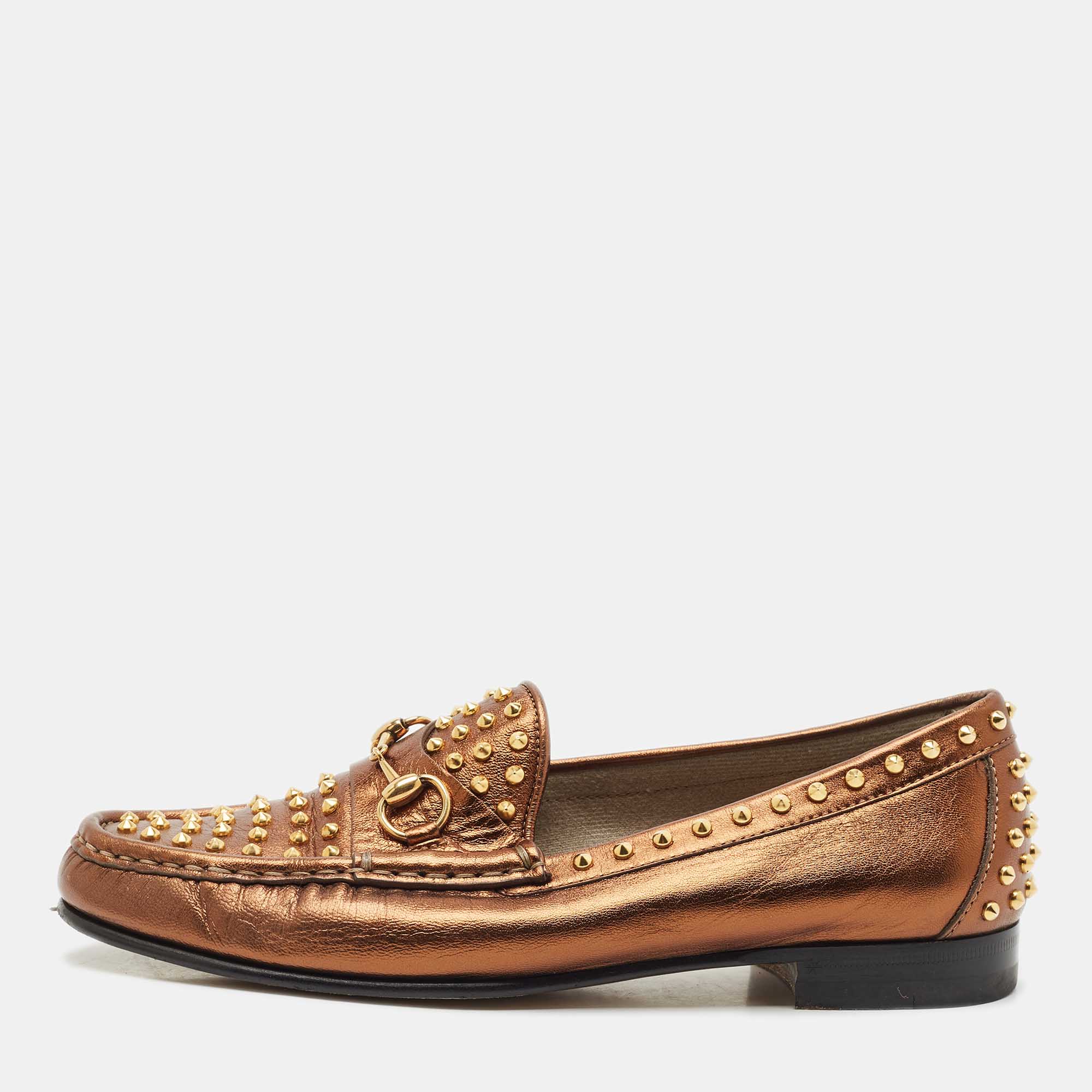 

Gucci Gold Leather Spike Embellished Slip On Loafers Size