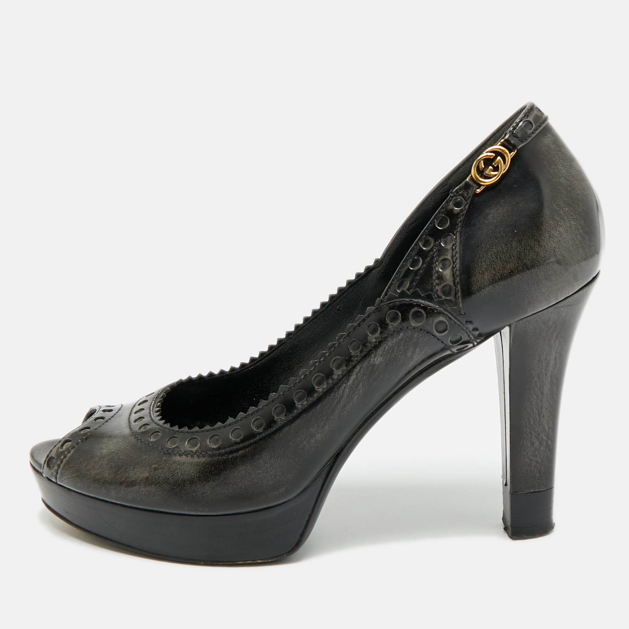 Click to view more detailed imagery on our partner's website Pre-owned Gucci Size 37.5 Black/grey Leather Platform Peep Toe Pumps