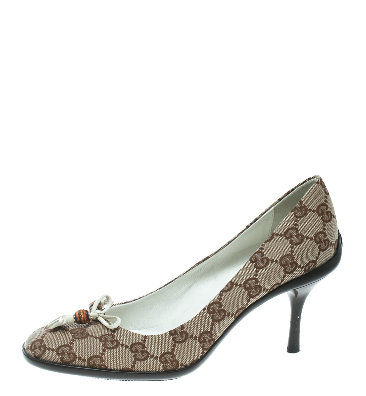

Gucci Beige Guccissima Canvas Bamboo Bow Tassel Pumps Size