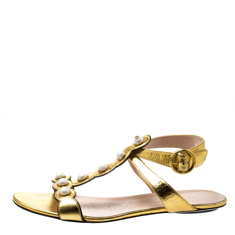 

Gucci Metallic Gold Leather Willow Faux Pearl Embellished Ankle Wrap Flat Sandals Size