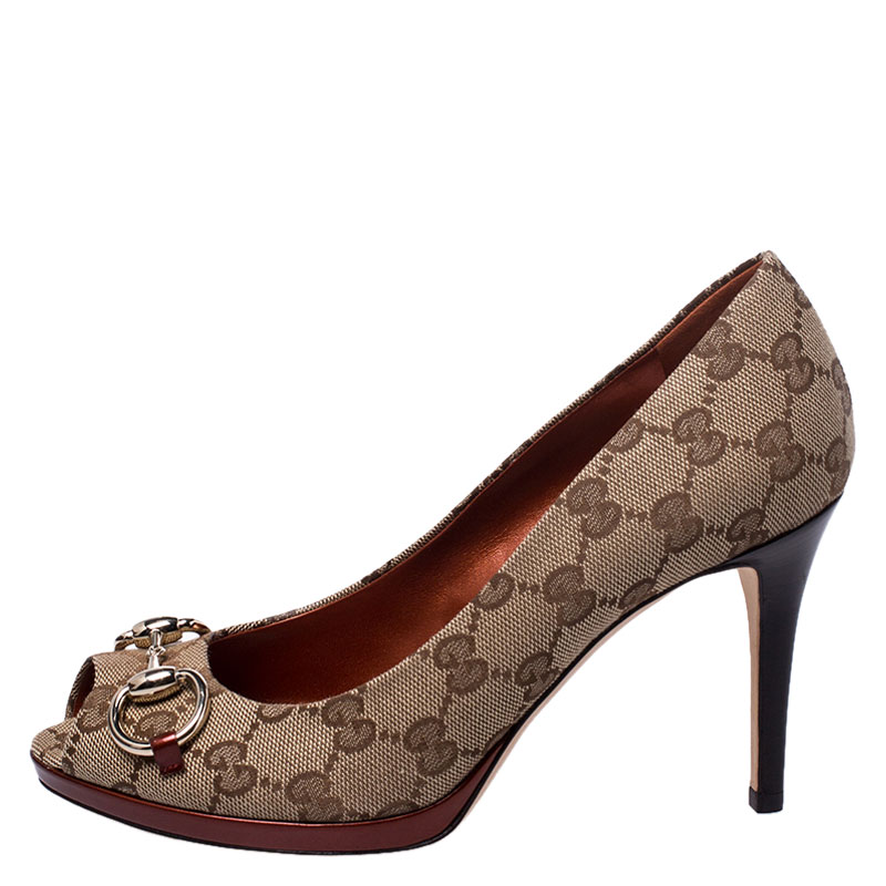 

Gucci Beige GG Canvas And Leather New Hollywood Horsebit Peep Toe Pumps Size