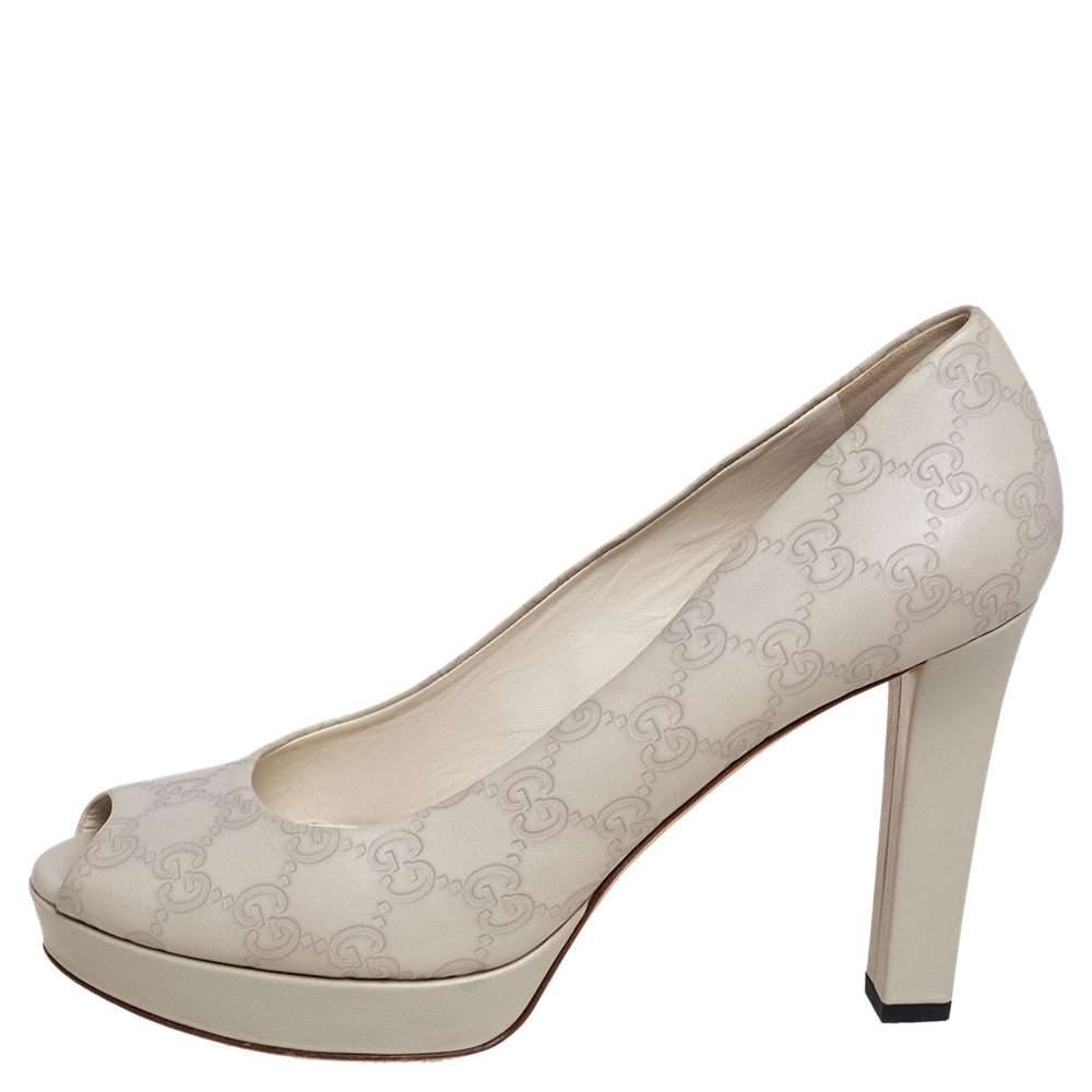 

Gucci Cream Guccissima Leather Peep Toe Platform Pumps Size