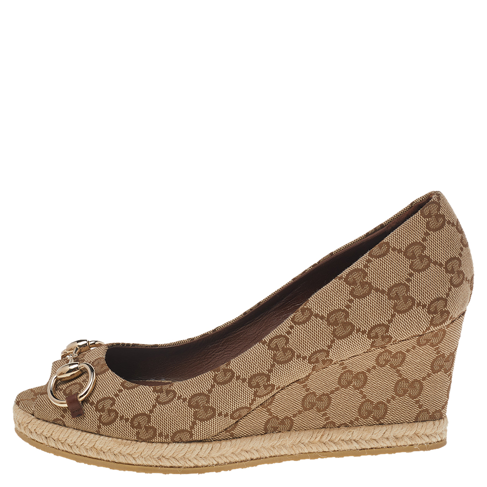 

Gucci Beige GG Canvas Wedge Peep Toe Pumps Size