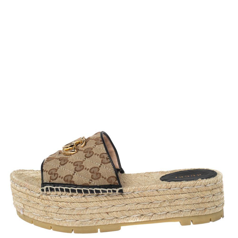 

Gucci Beige GG Canvas GG Logo Espadrille Platform Slides Size