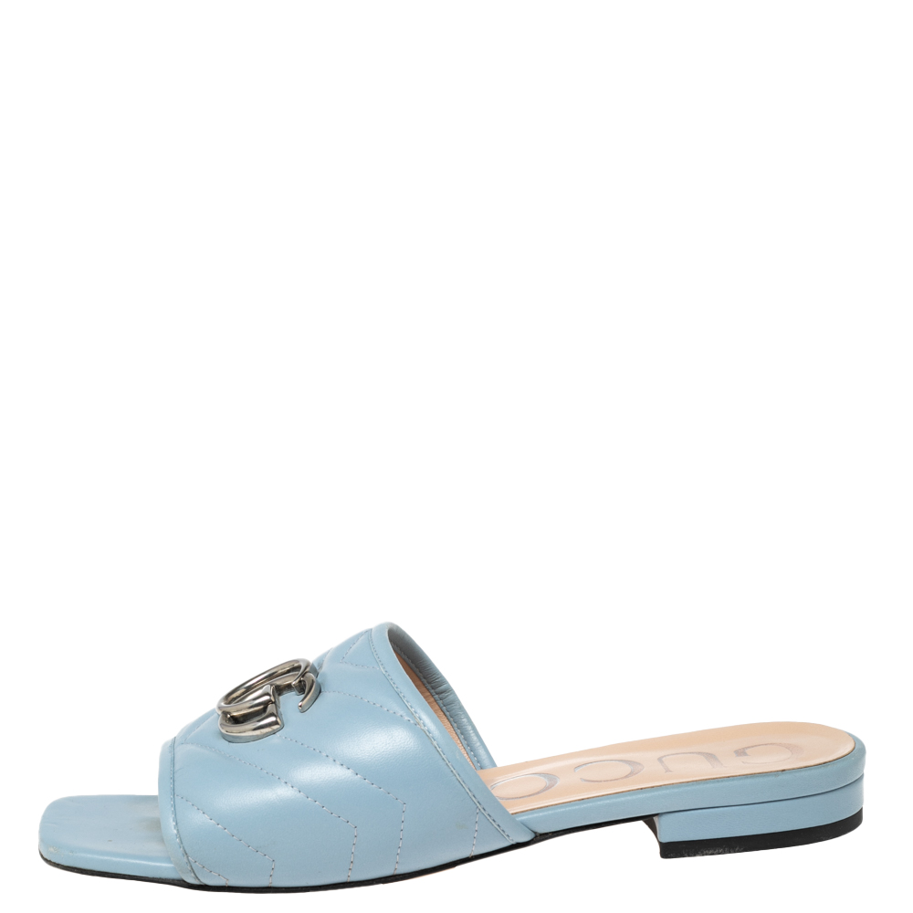 

Gucci Light Blue Quilted Leather Jolie Logo Slides Size