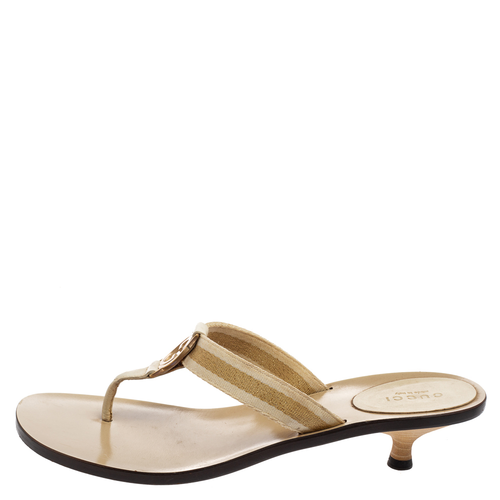 

Gucci Beige Canvas and Leather Interlocking G Thong Slide Sandals Size