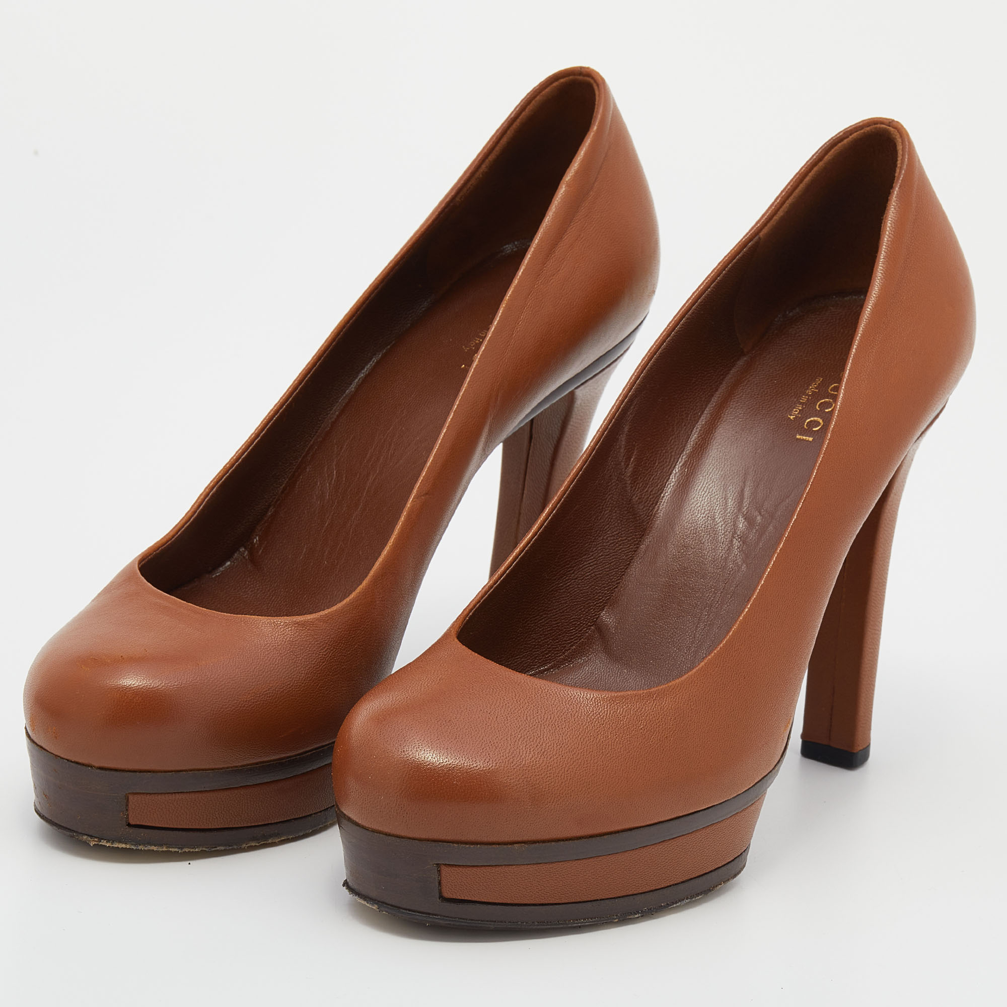 

Gucci Brown Leather Round Toe Platform Pumps Size