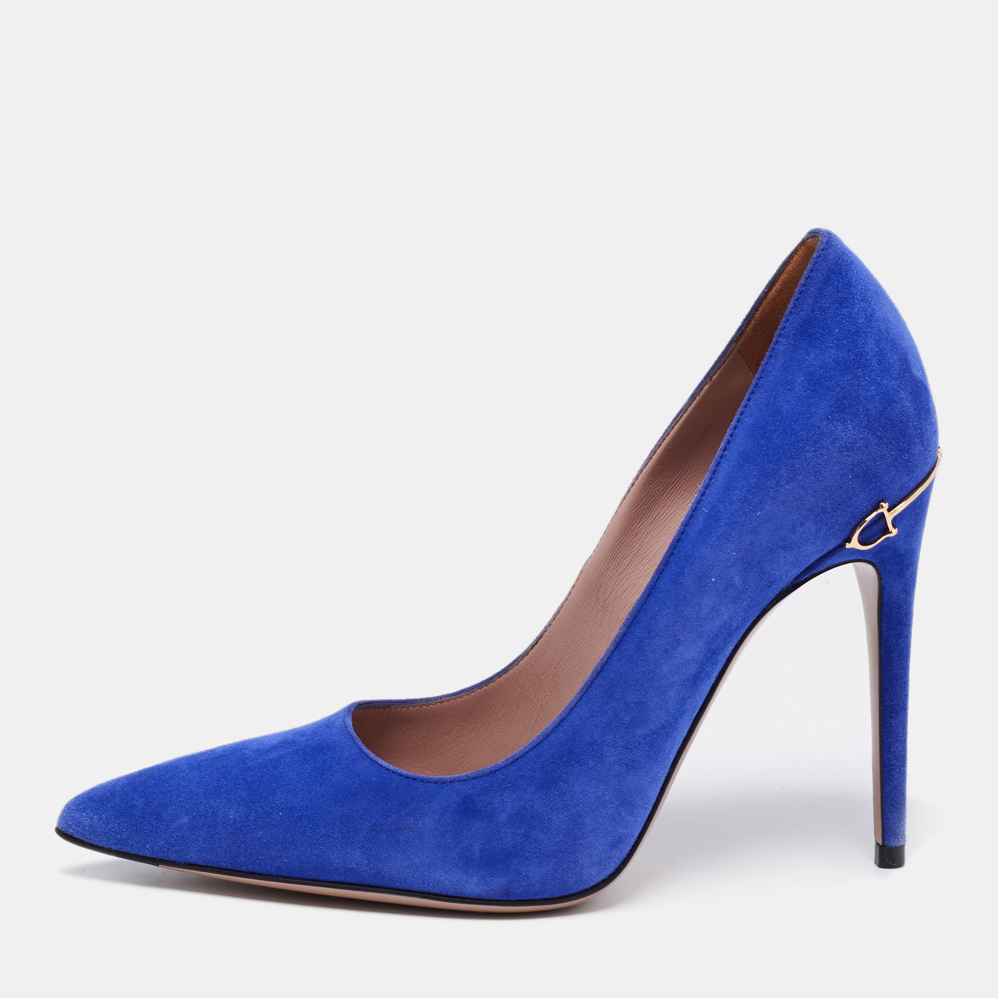 Take every step with elegance and style in these gorgeous pumps from the House of Gucci. They are crafted meticulously using blue suede. They showcase pointed toes slender heels and a slip on feature. These beautiful Gucci pumps will be your favorite pair in no time