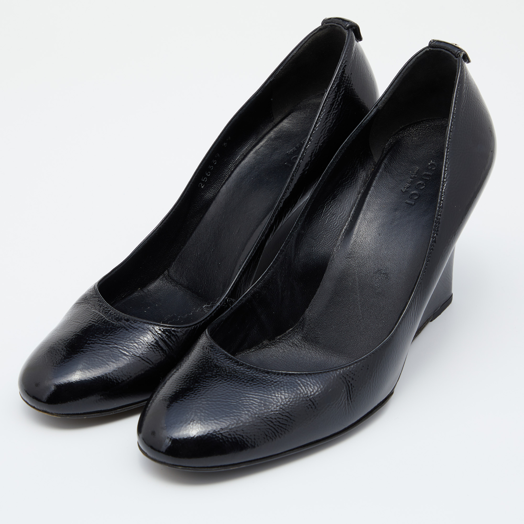 

Gucci Black Leather Wedge Pumps Size