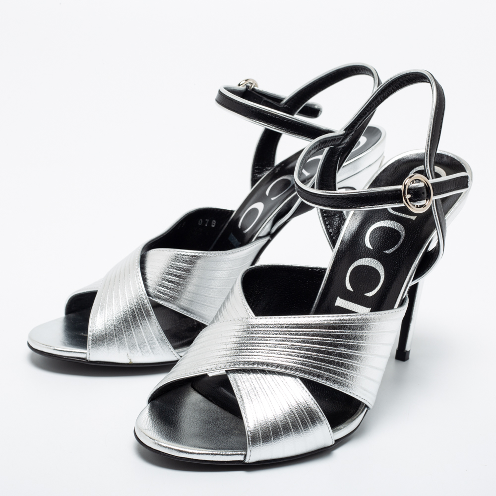 

Gucci Metallic Silver Leather Criss Cross Ankle Strap Sandals Size