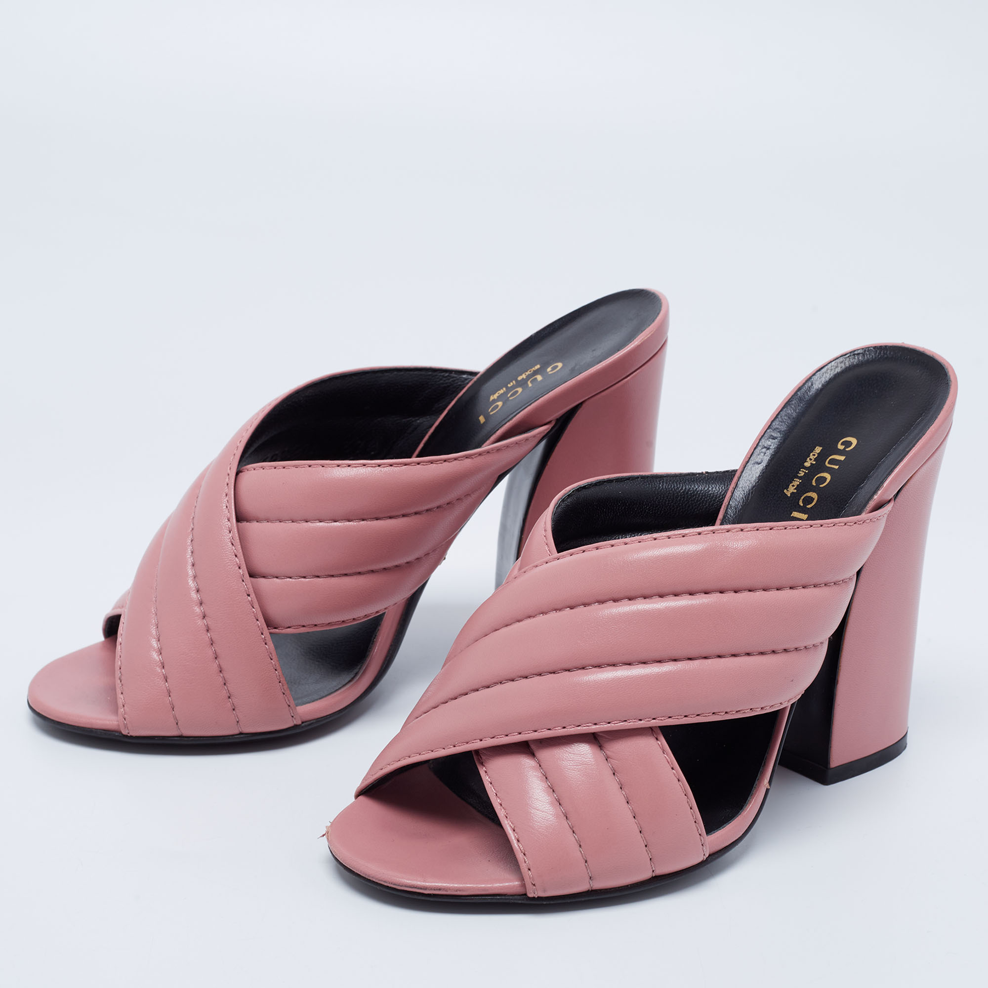 

Gucci Pink Leather Crossover Block Heel Mules Size