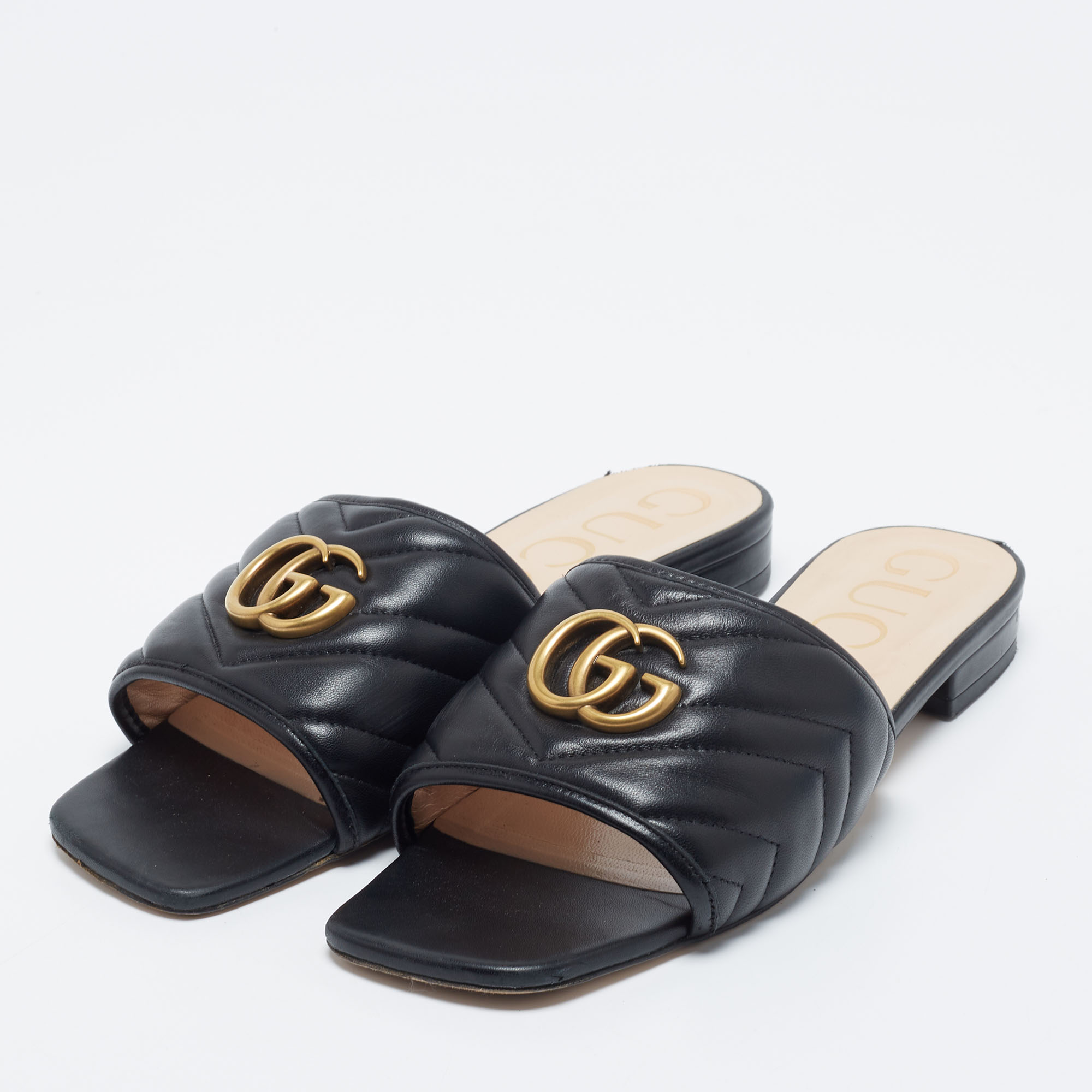 

Gucci Black Quilted Leather Jolie Logo Flat Slide Sandals Size