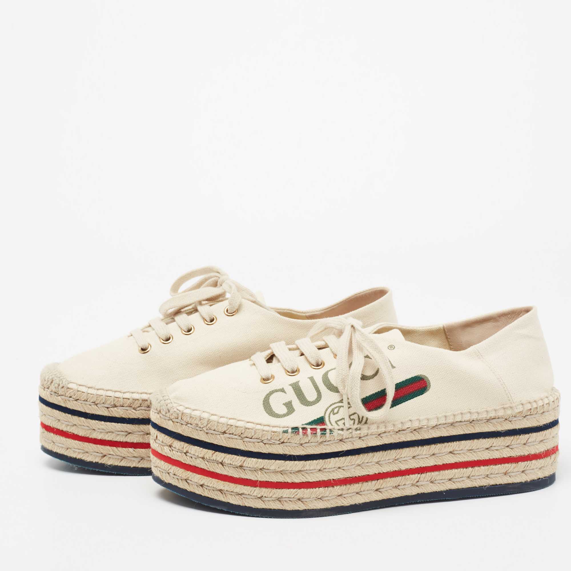 

Gucci Cream Canvas Logo Lace-Up Platform Espadrilles Size