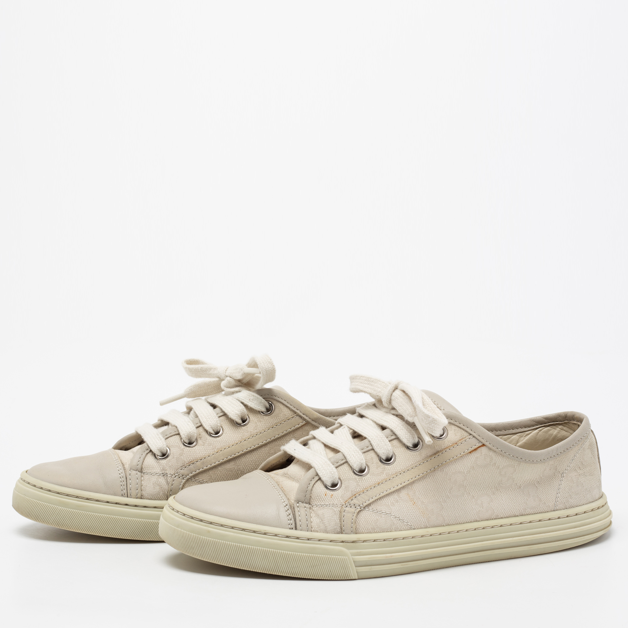 

Gucci Cream GG Canvas And Leather Low Top Sneakers Size