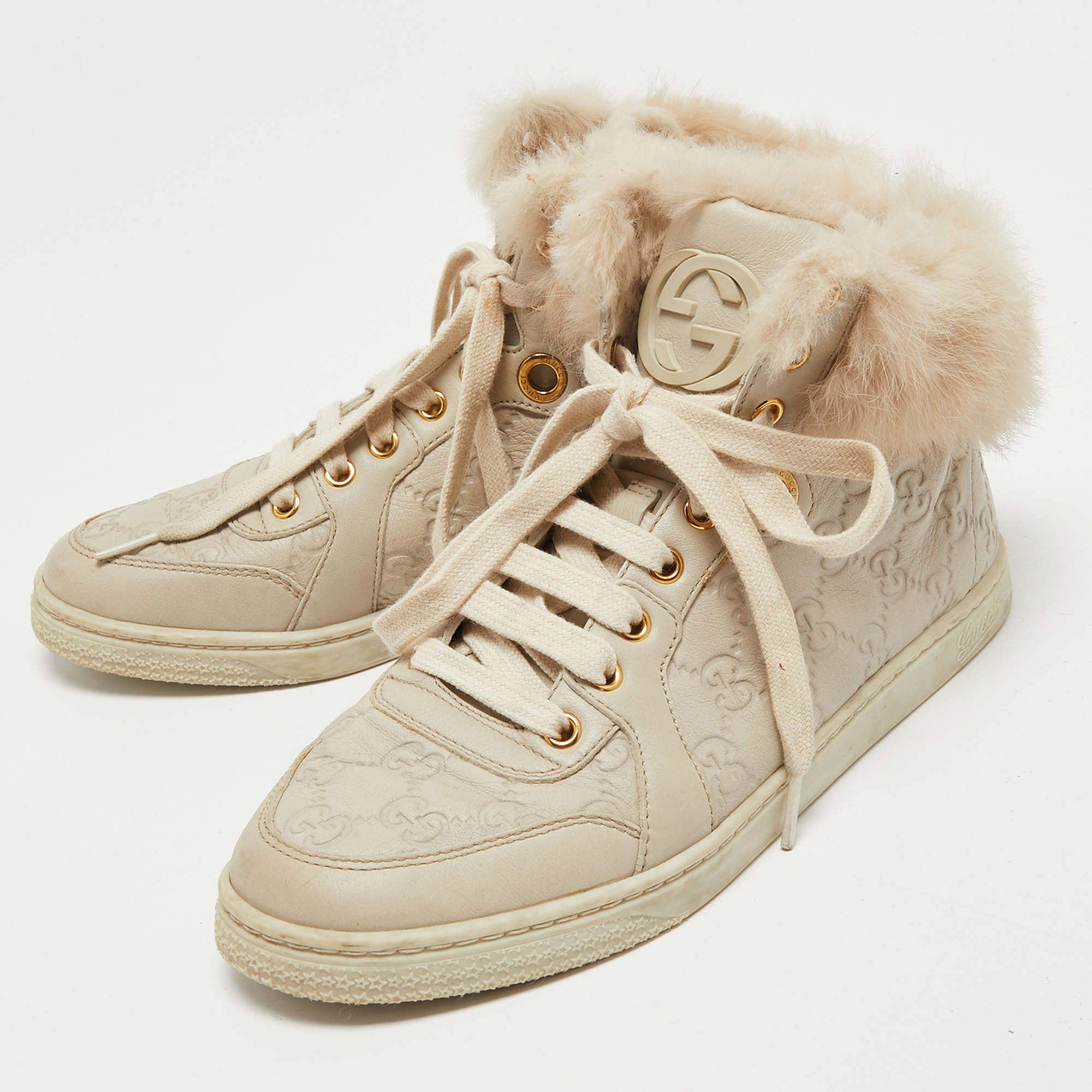 

Gucci Cream Guccissima Leather and Fur High Top Sneakers Size