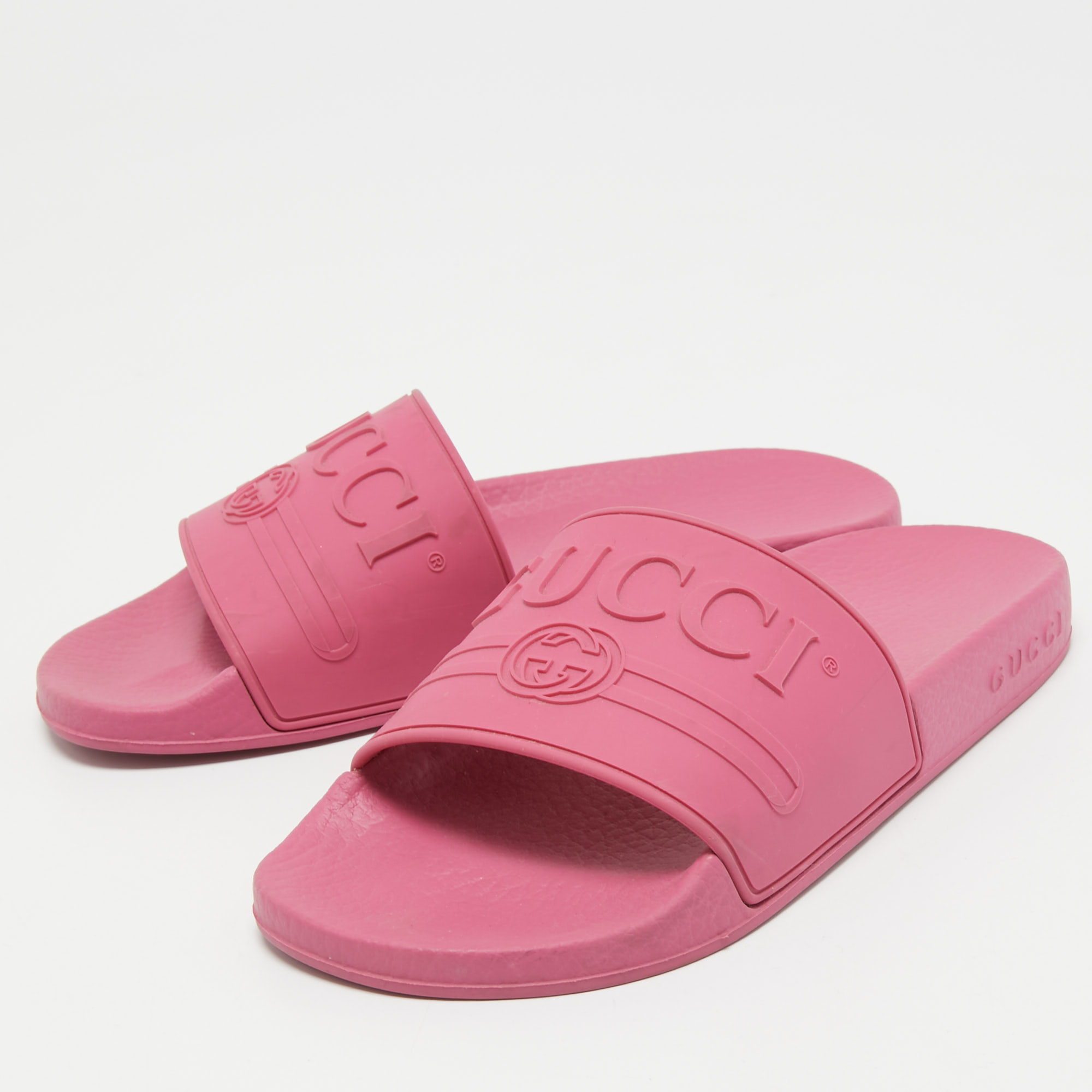 

Gucci Pink Logo Embossed Rubber Slides Size