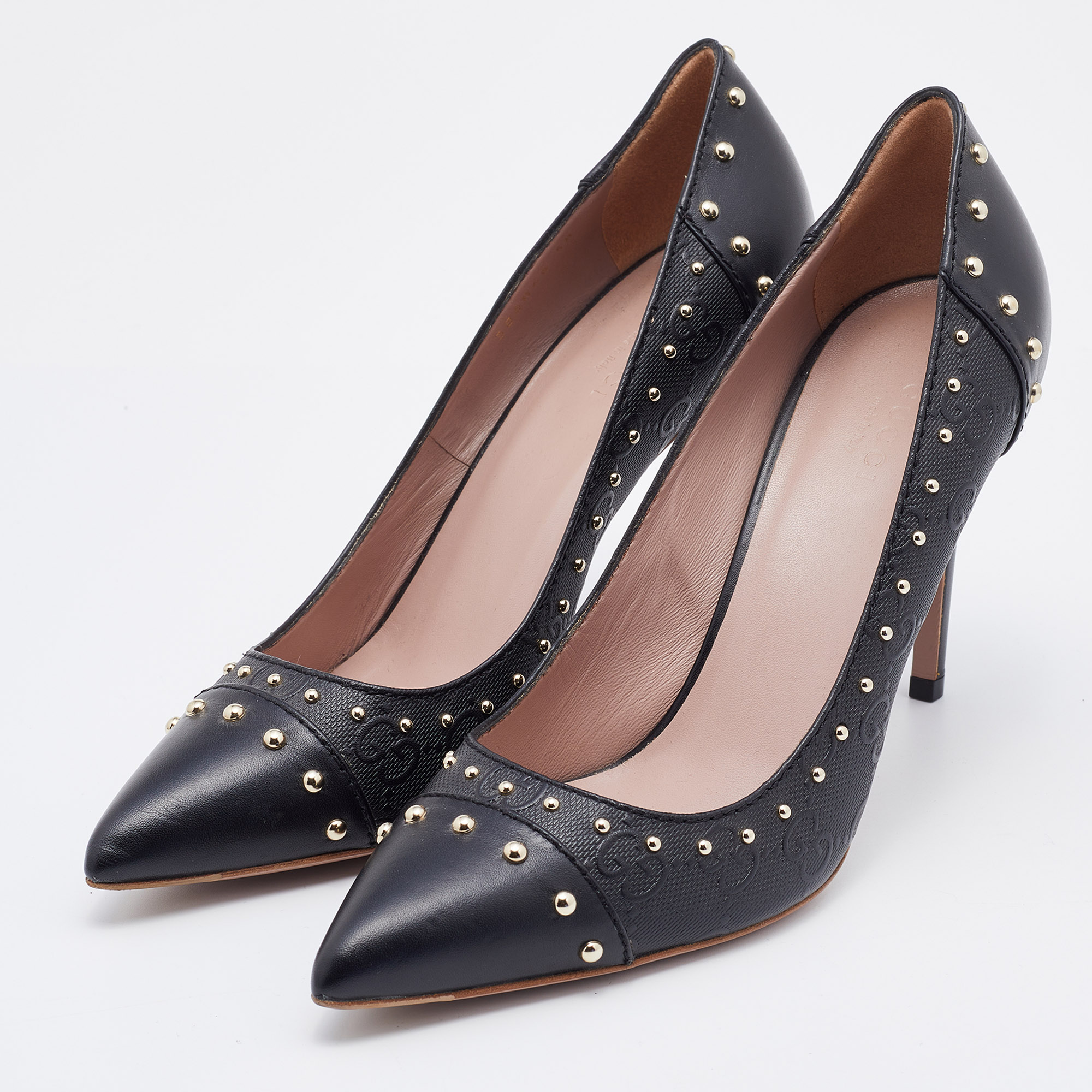 

Gucci Black GG Embossed Leather Embellished Pumps Size