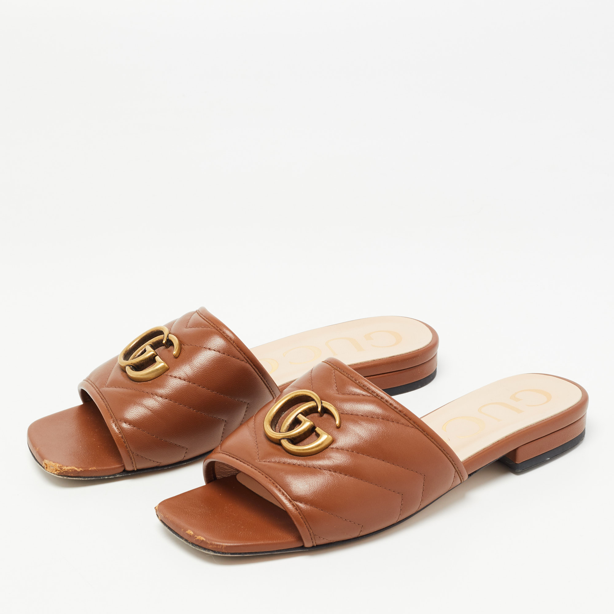 

Gucci Brown Matelasse Leather GG Marmont Flat Slides Size