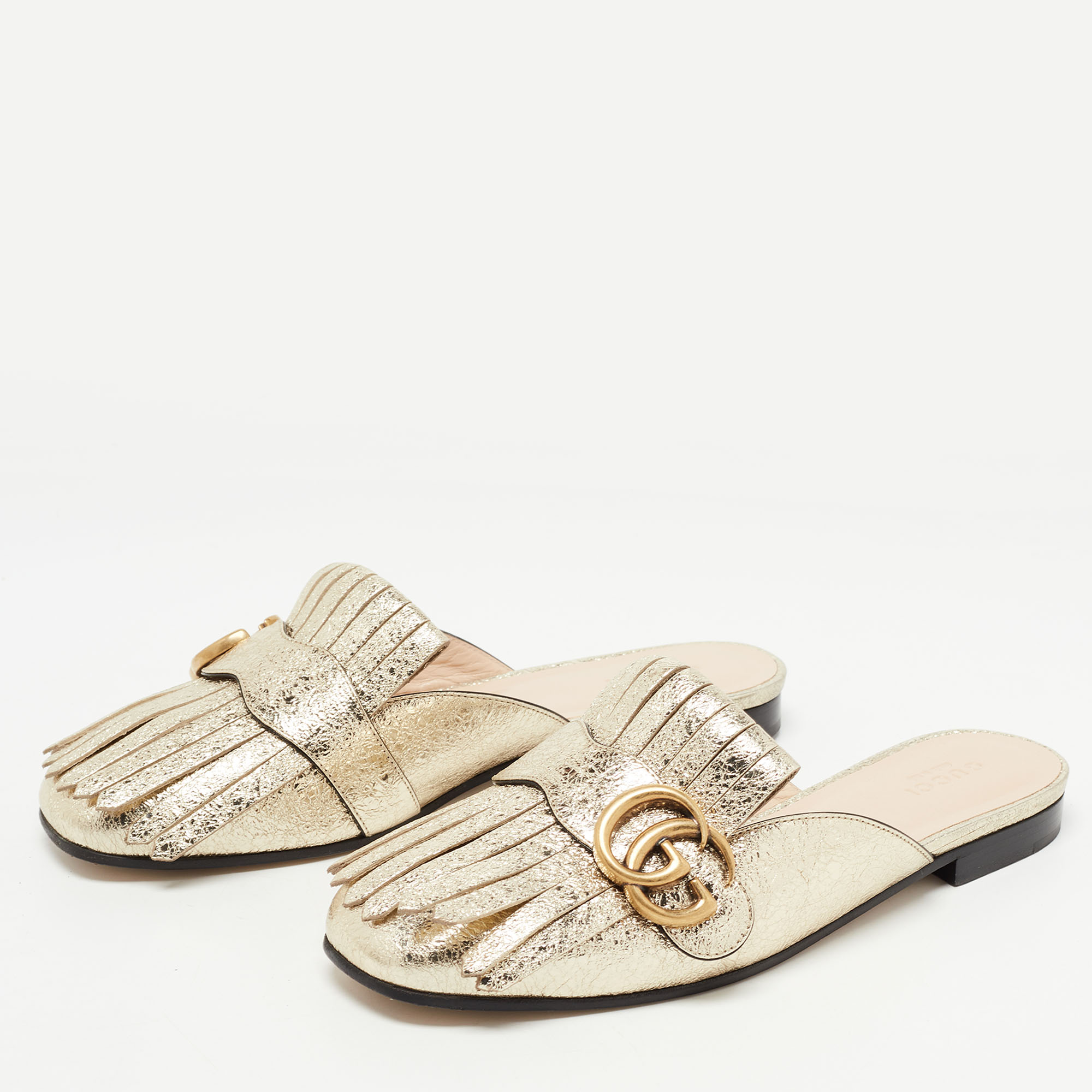 

Gucci Metallic Gold Foil Leather Double G Fringe Flat Mules Size