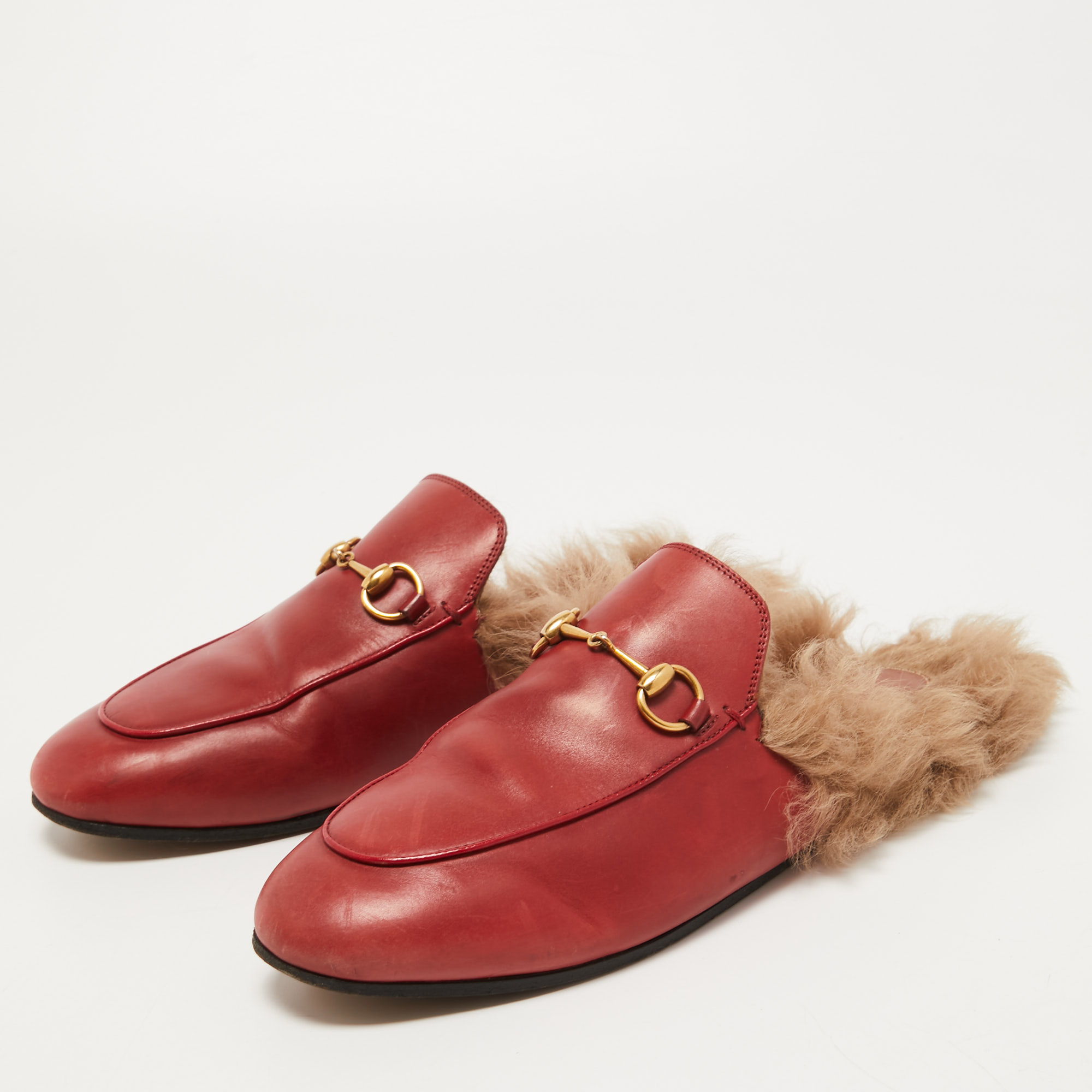 

Gucci Dark Red Leather and Fur Princetown Flat Mules Size