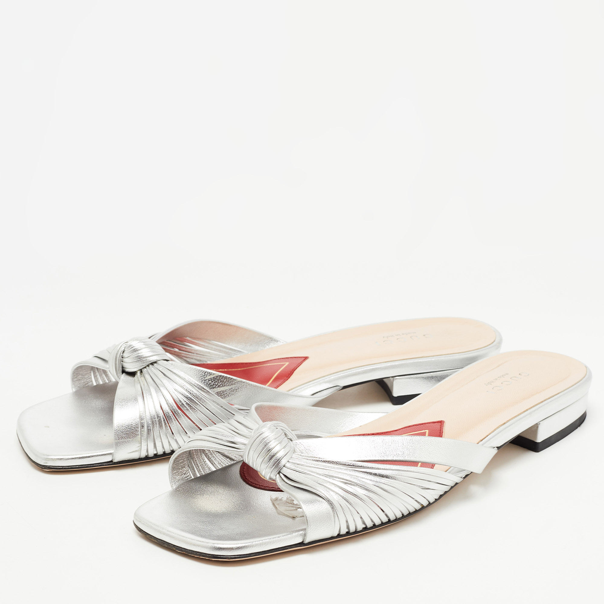 

Gucci Silver Knotted Leather Flat Slides Size