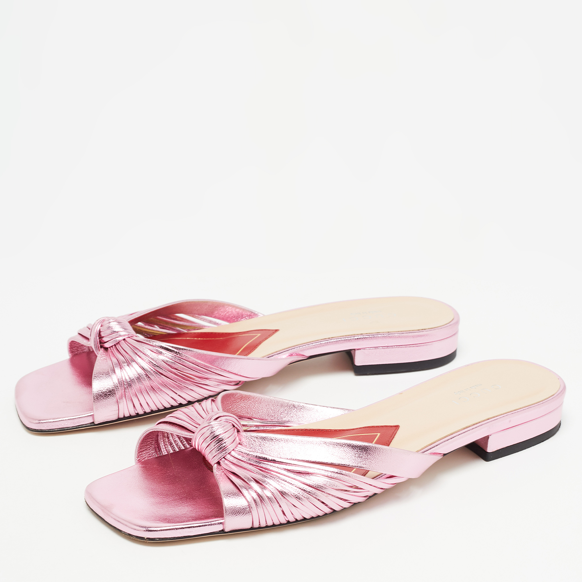 

Gucci Metallic Pink Knotted Leather Flat Slides Size