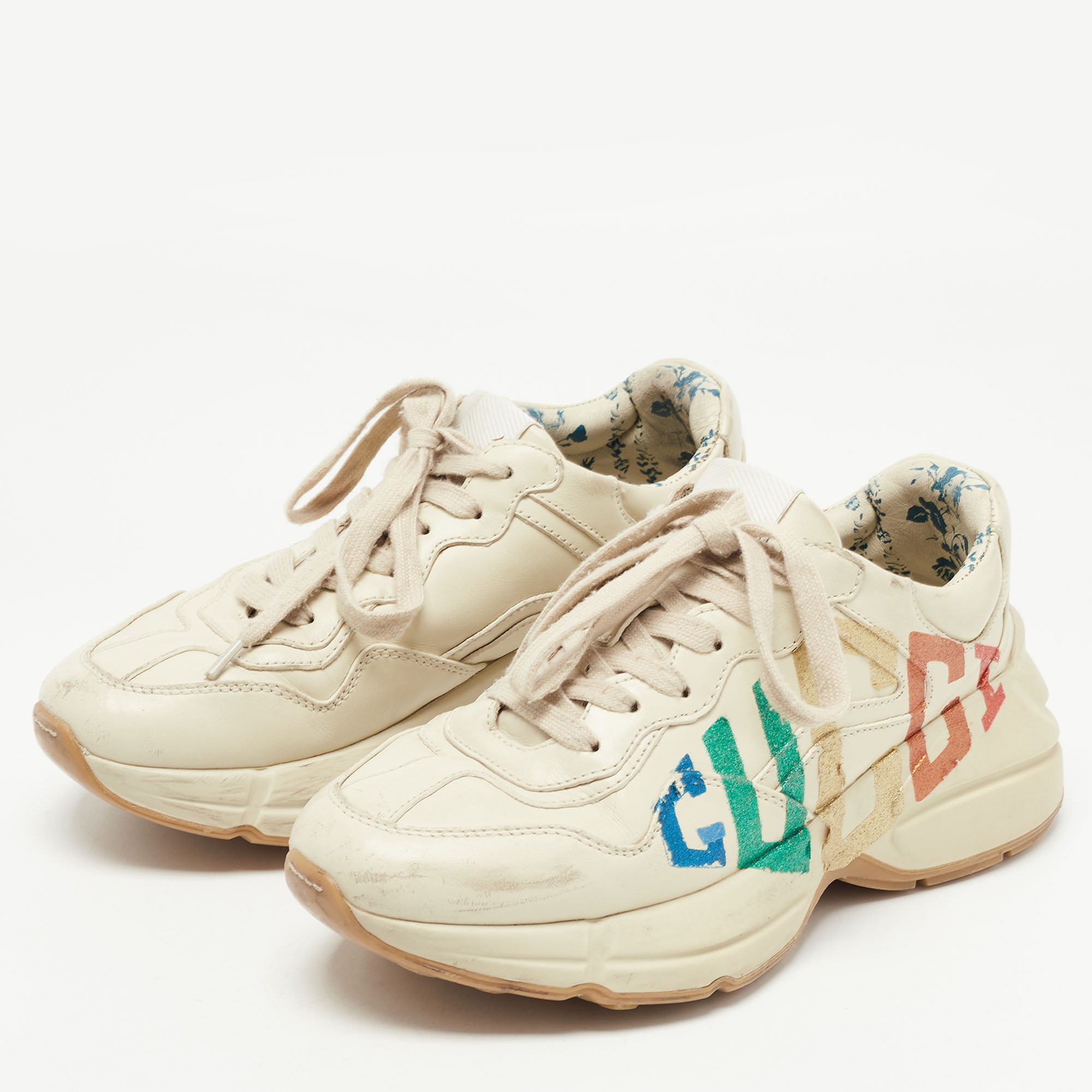 

Gucci Cream Leather Glitter Logo Rhyton Sneakers Size