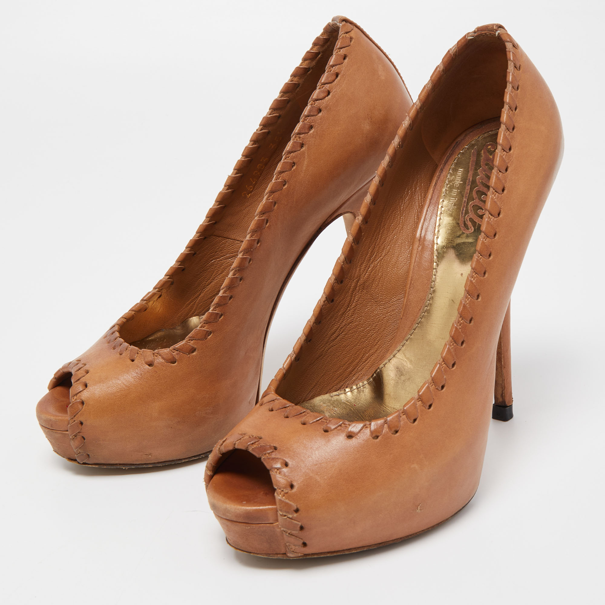 

Gucci Tan Leather Whipstitch Peep Toe Pumps Size