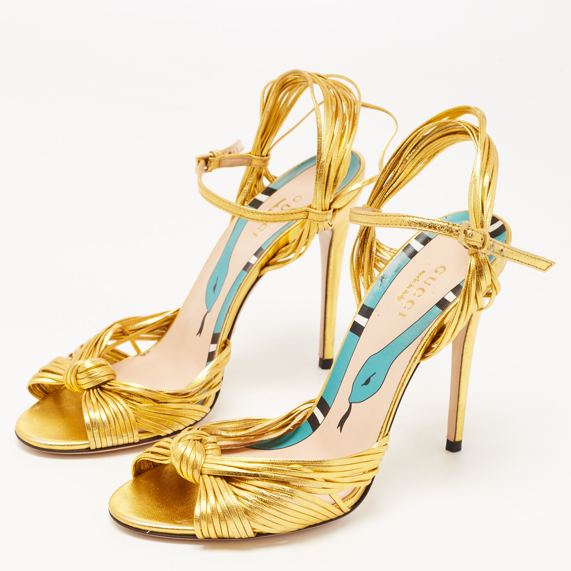 

Gucci Gold Foil Leather Allie Knot Ankle Strap Sandals Size