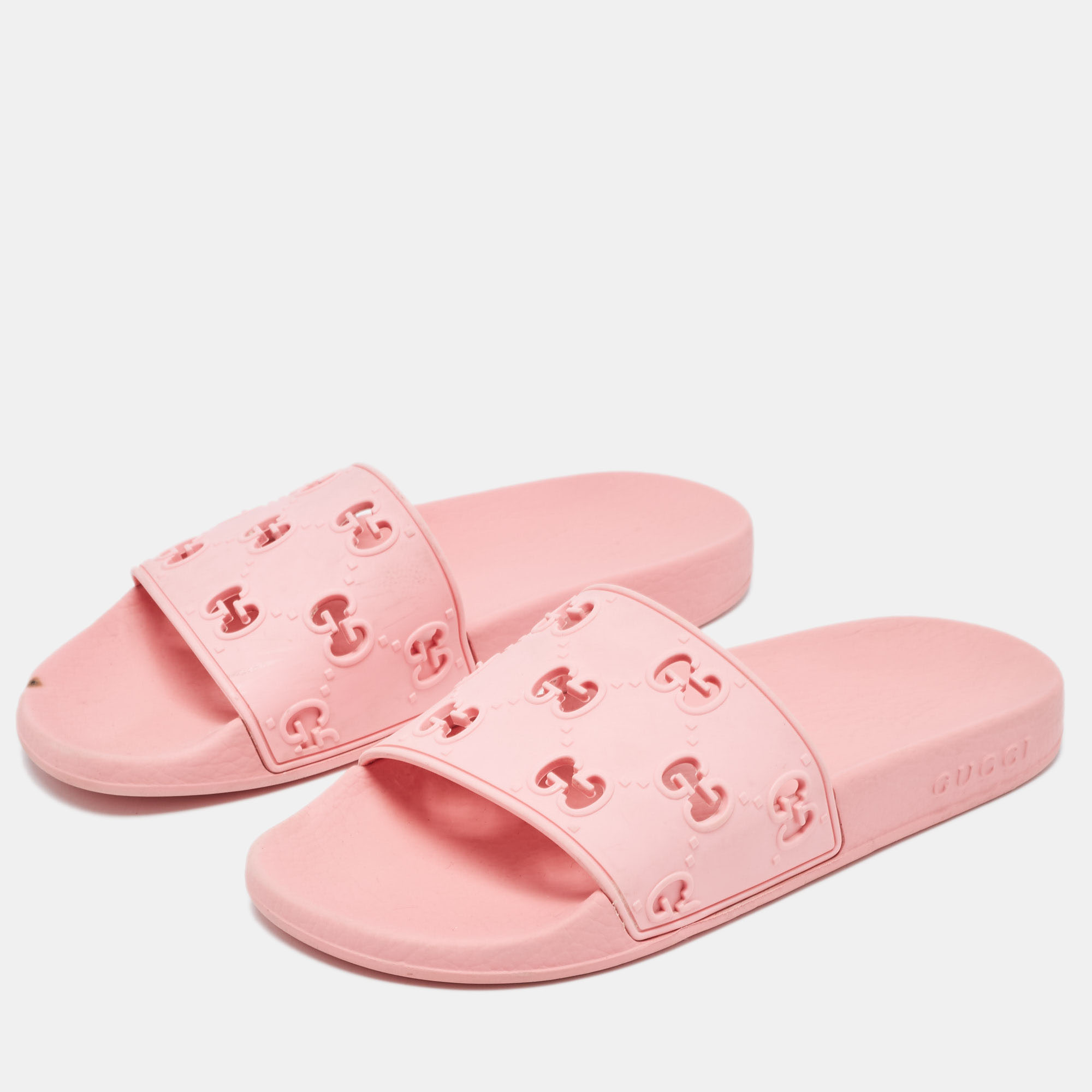 

Gucci Pink Rubber GG Laser Cut Slides Size