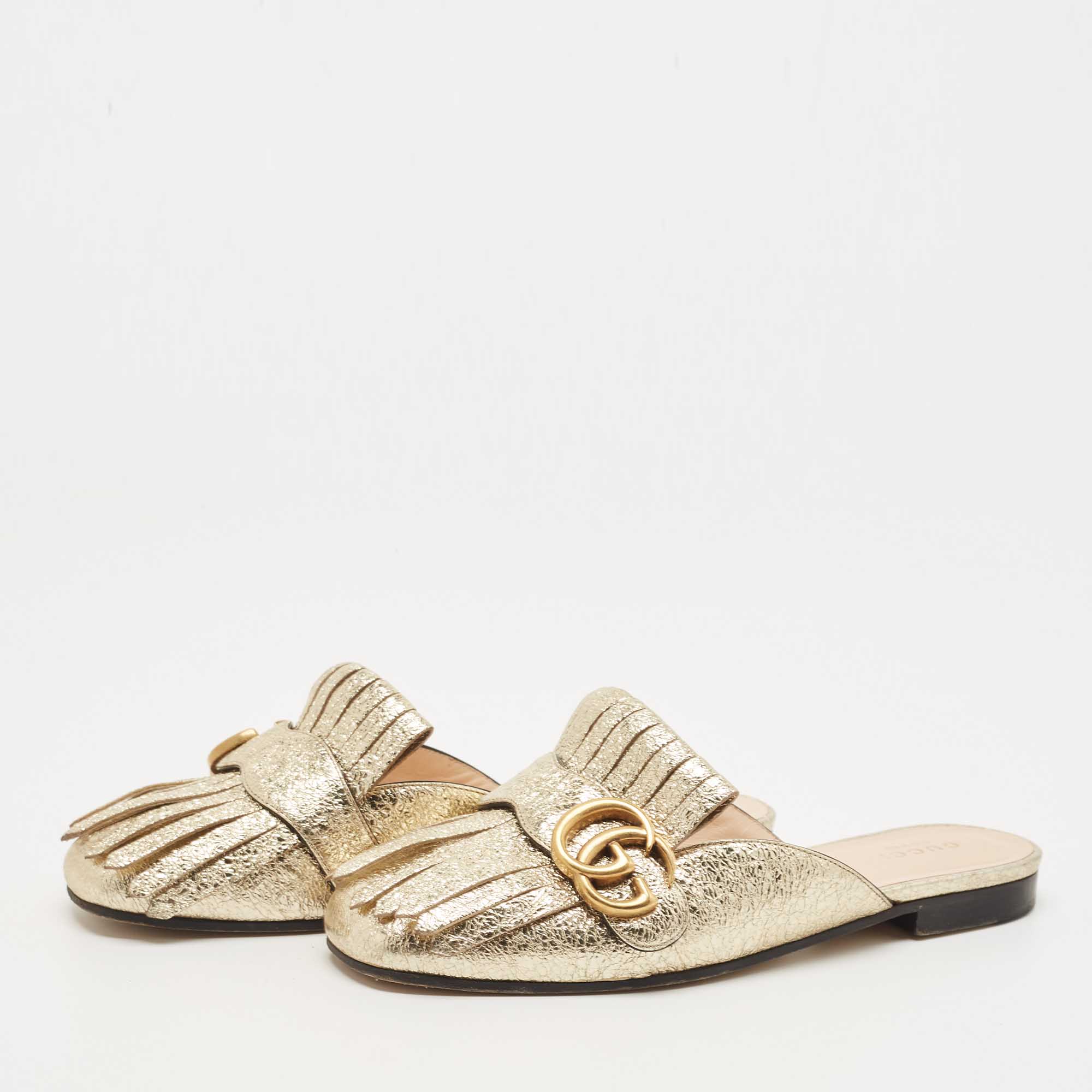 

Gucci Gold Foil Leather GG Marmont Fringe Detail Flat Mules Size
