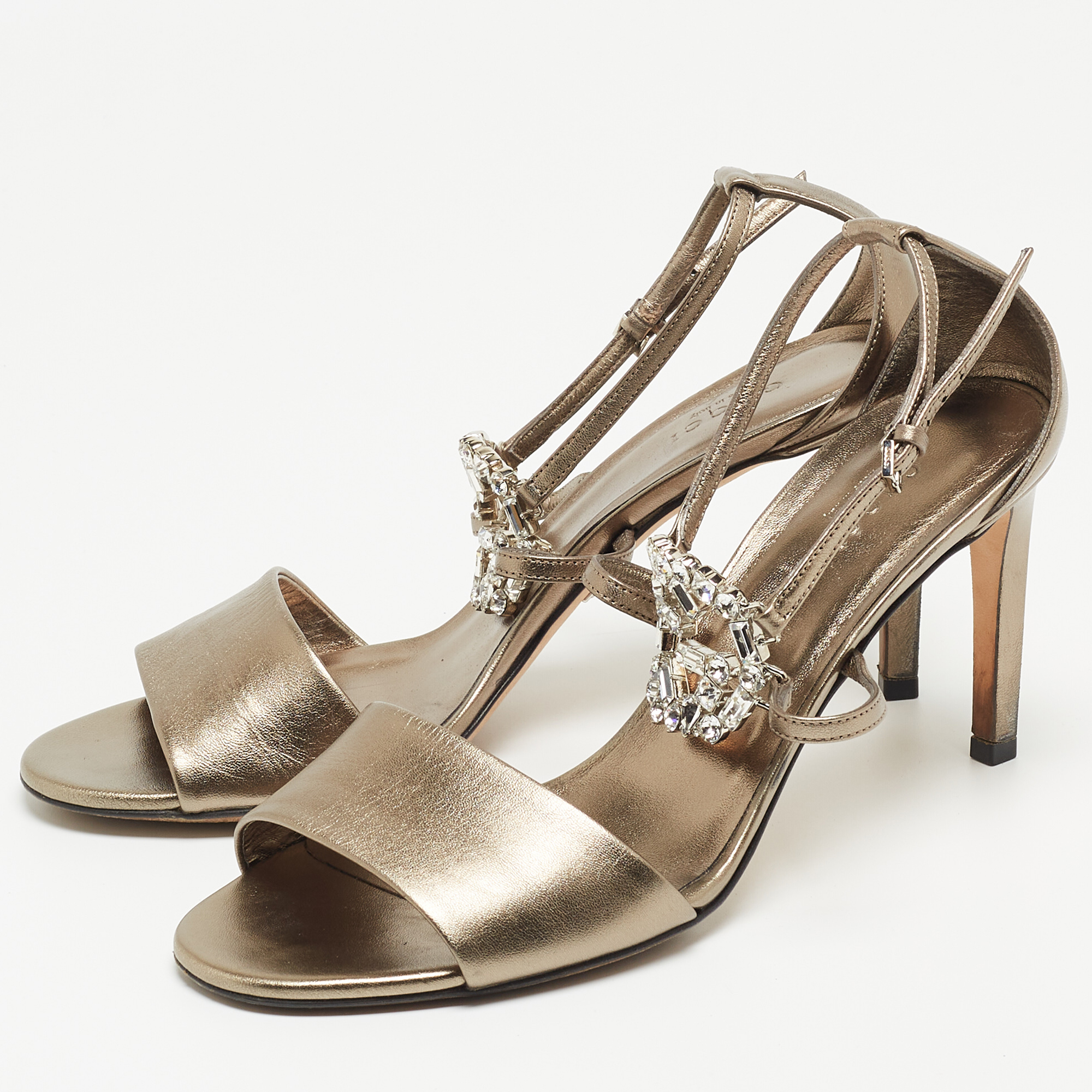 

Gucci Metallic Grey Leather Crystal Embellished Ankle Strap Sandals Size