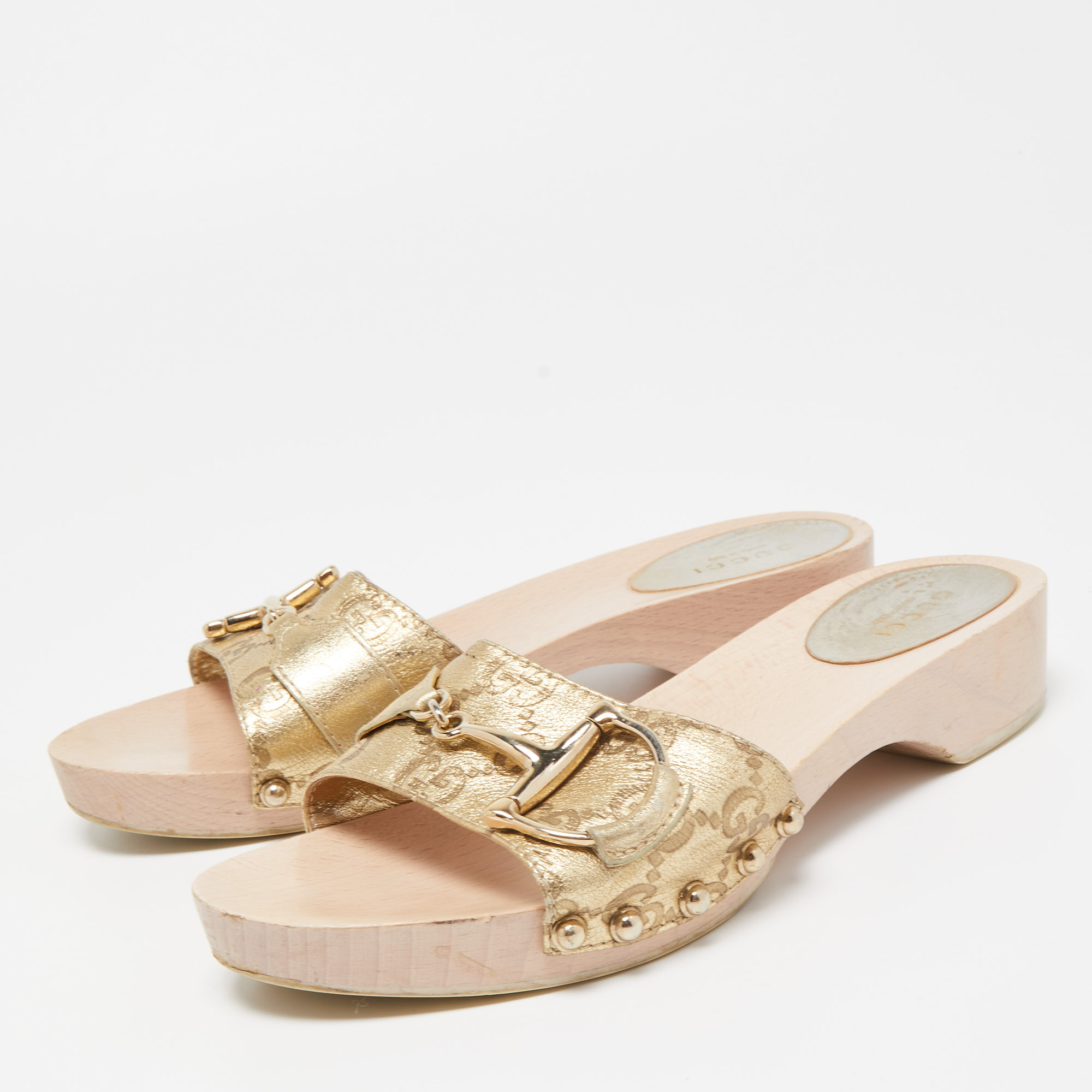 

Gucci Metallic Gold Guccissima Leather 'Icon Bit' Wooden Clog Slides Size
