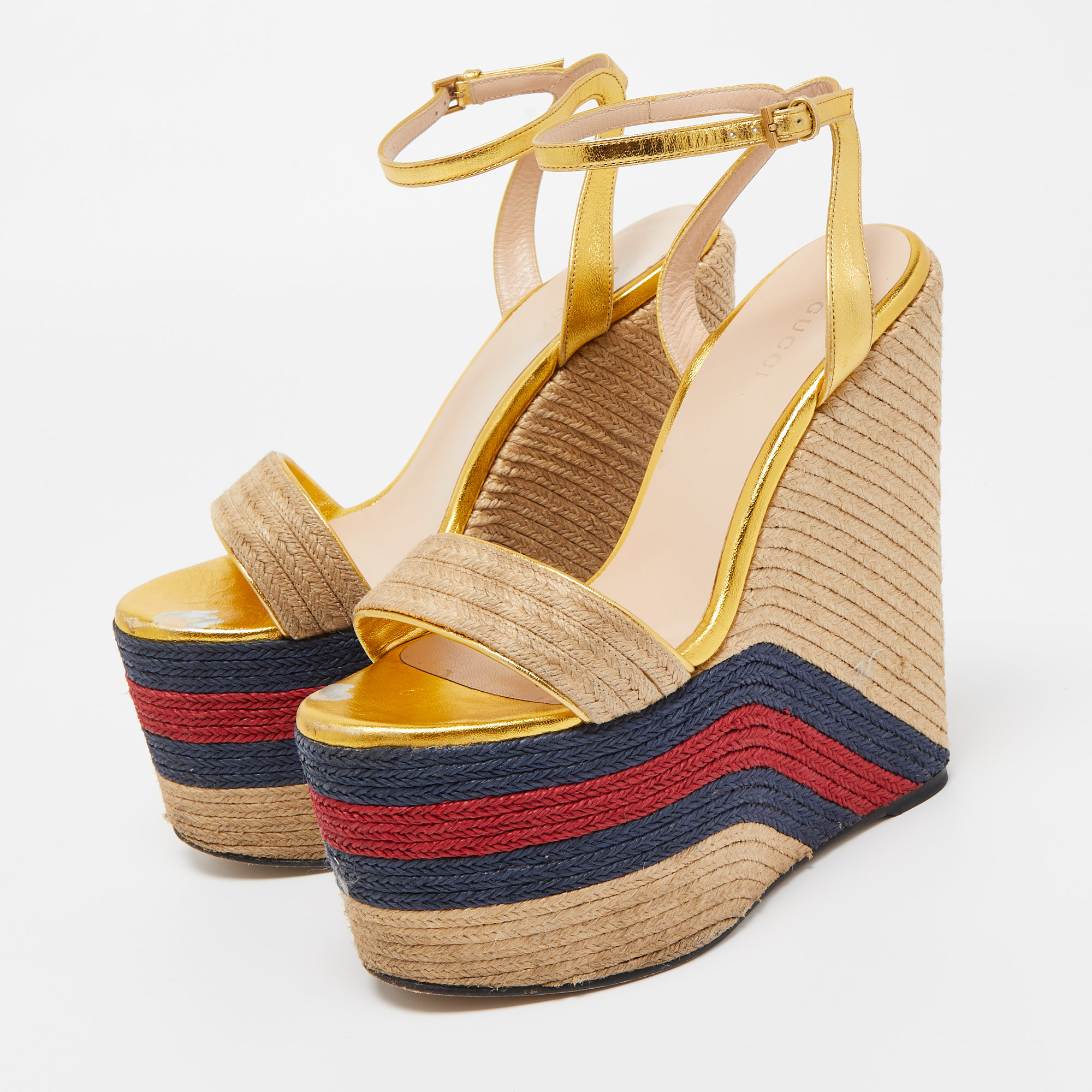 

Gucci Metallic Gold Leather And Jute Espadrille Wedge Platform Ankle Strap Sandals Size