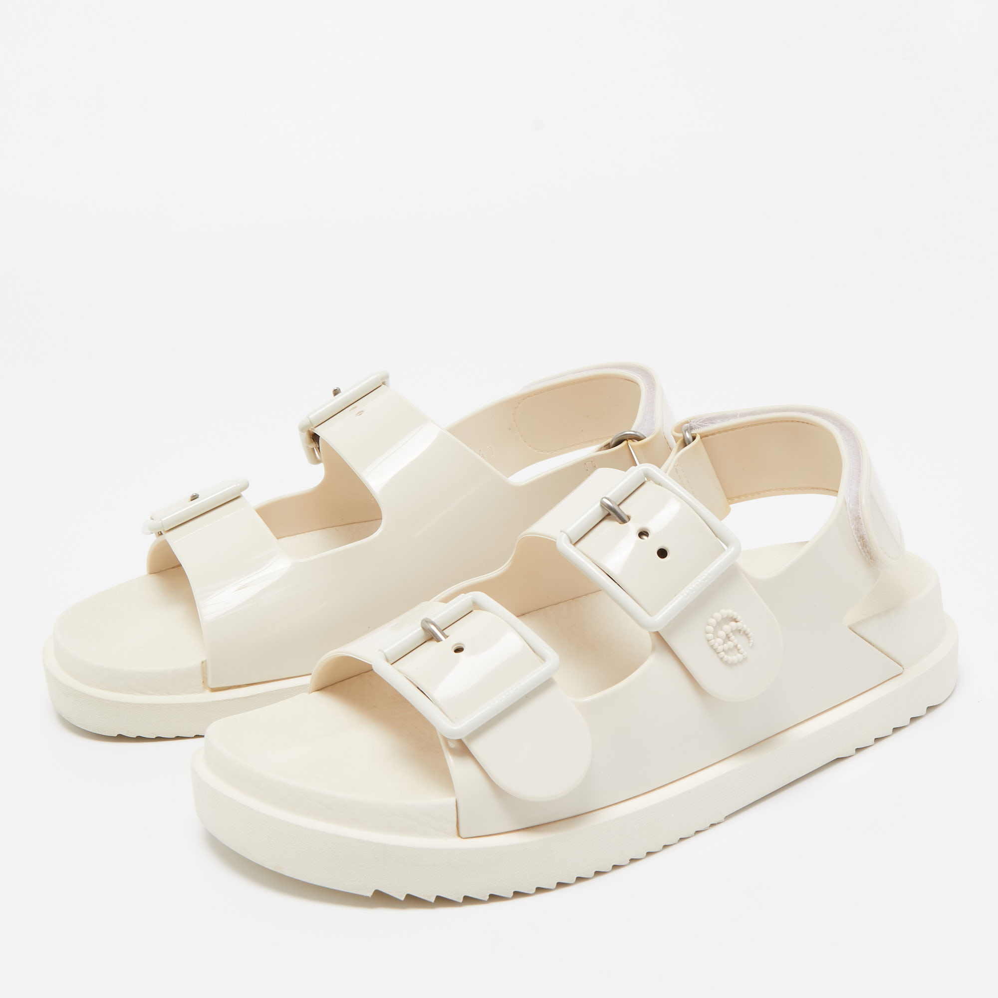 

Gucci White Rubber Double Buckle Slingback Flat Sandals Size