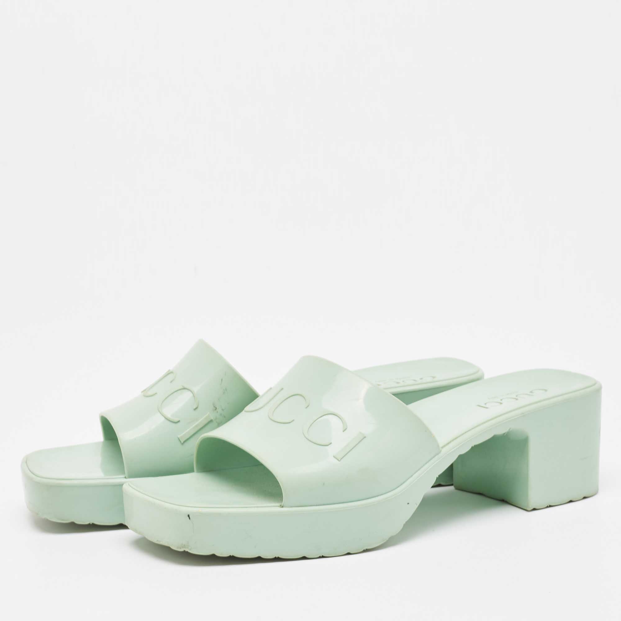 

Gucci Mint Green Rubber Logo Embossed Slide Sandals Size