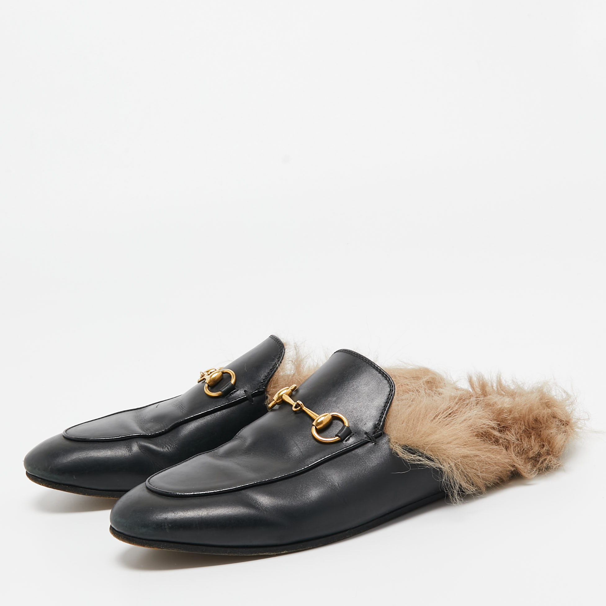 

Gucci Black Leather and Fur Princetown Mules Size