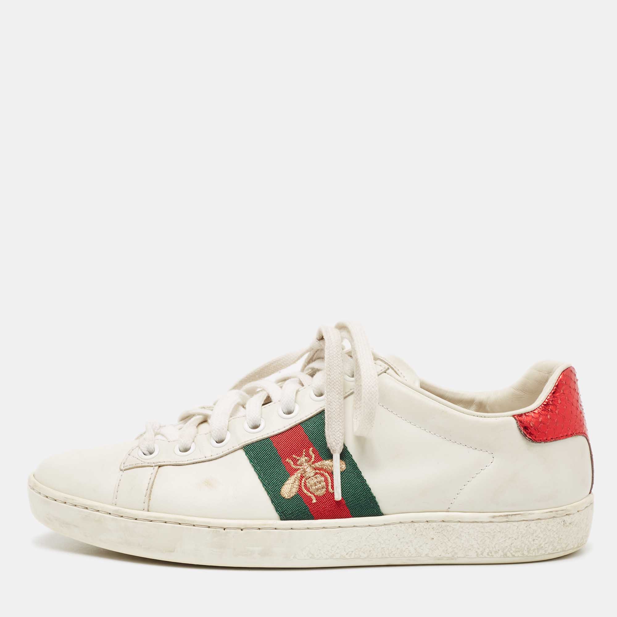 Stacked with signature details this Gucci pair is rendered from leather on the exterior and these shoes have been fashioned with iconic web stripes along with a bee motif on the sides. Complete with brand detailing on the back these shoes can be easily coordinated with your casuals.