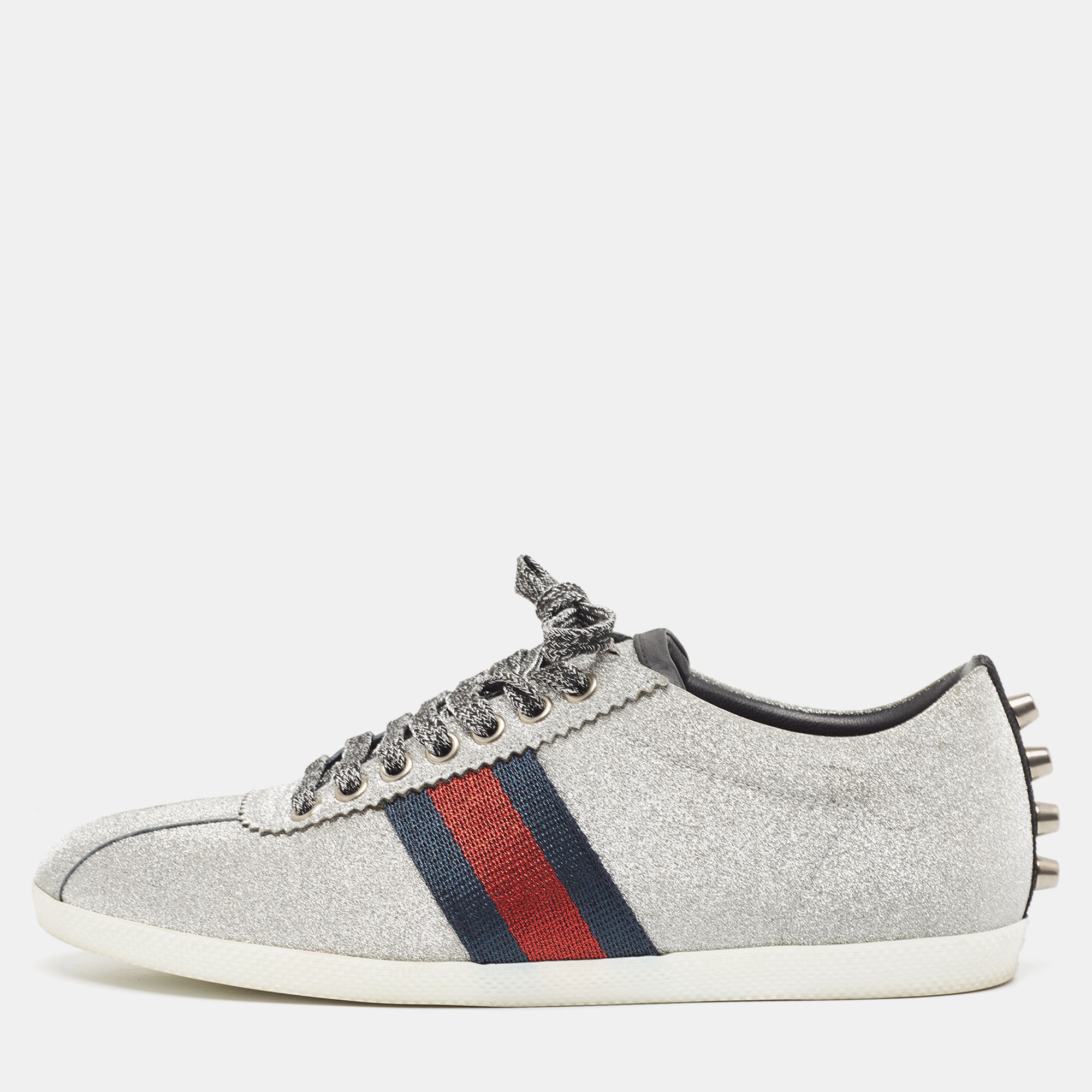 Presented in a classic silhouette these Gucci silver sneakers are a seamless combination of luxury comfort and style. These sneakers are designed with signature details and comfortable insoles.
