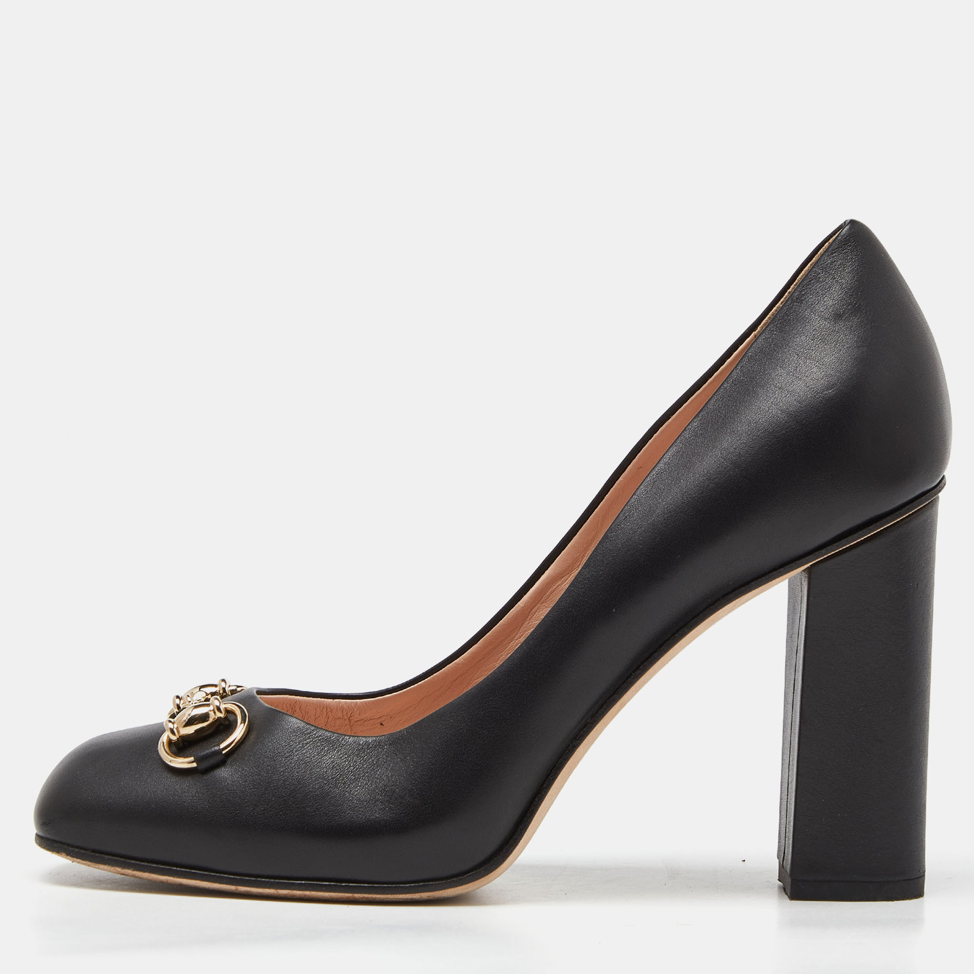 Grace and poise will all come naturally to you when you step out in this pair of pumps from Gucci. Crafted from black leather the square toe pumps have been styled with 10cm block heels and the iconic Horsebit detail on the uppers. They are finished with gold tone hardware and leather soles.