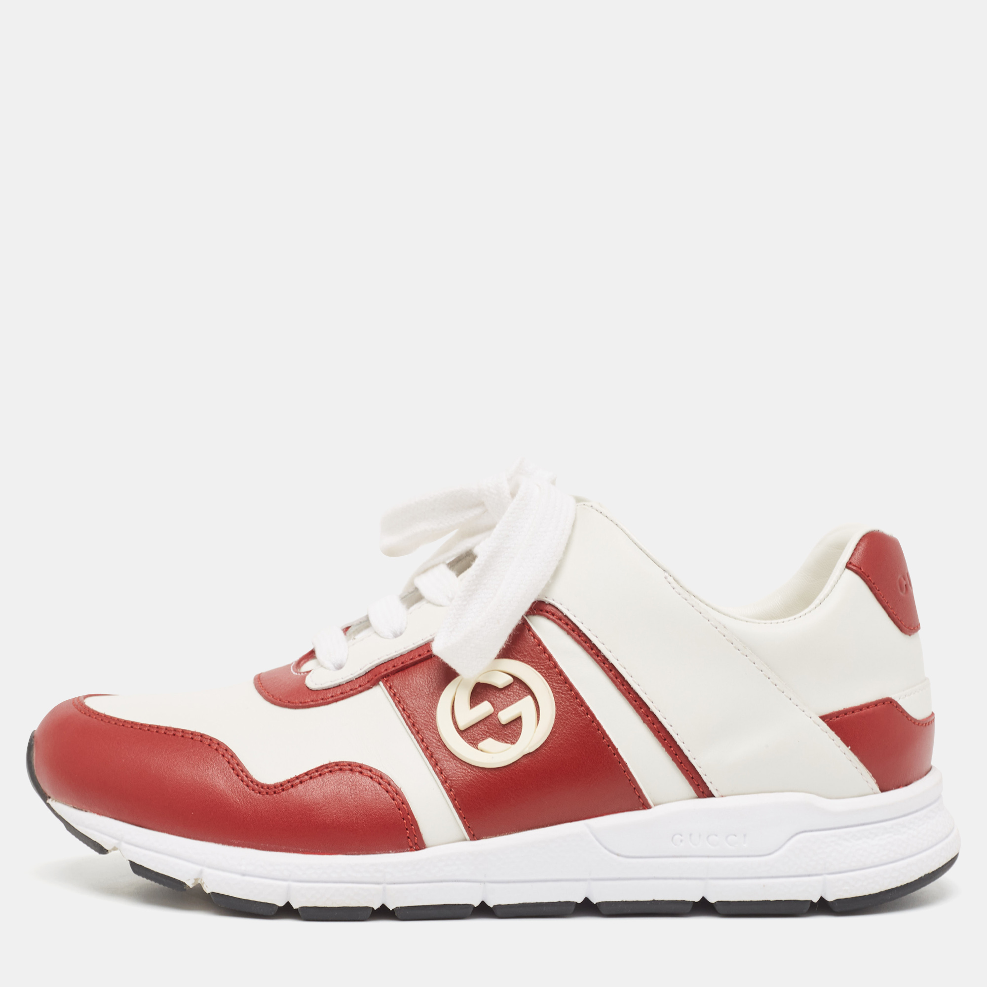 Coming in a classic low top silhouette these Gucci sneakers are a seamless combination of luxury comfort and style. They are made from leather in a white and red shade. These sneakers are designed with interlocking G logos on the side laced up vamps and comfortable insoles.