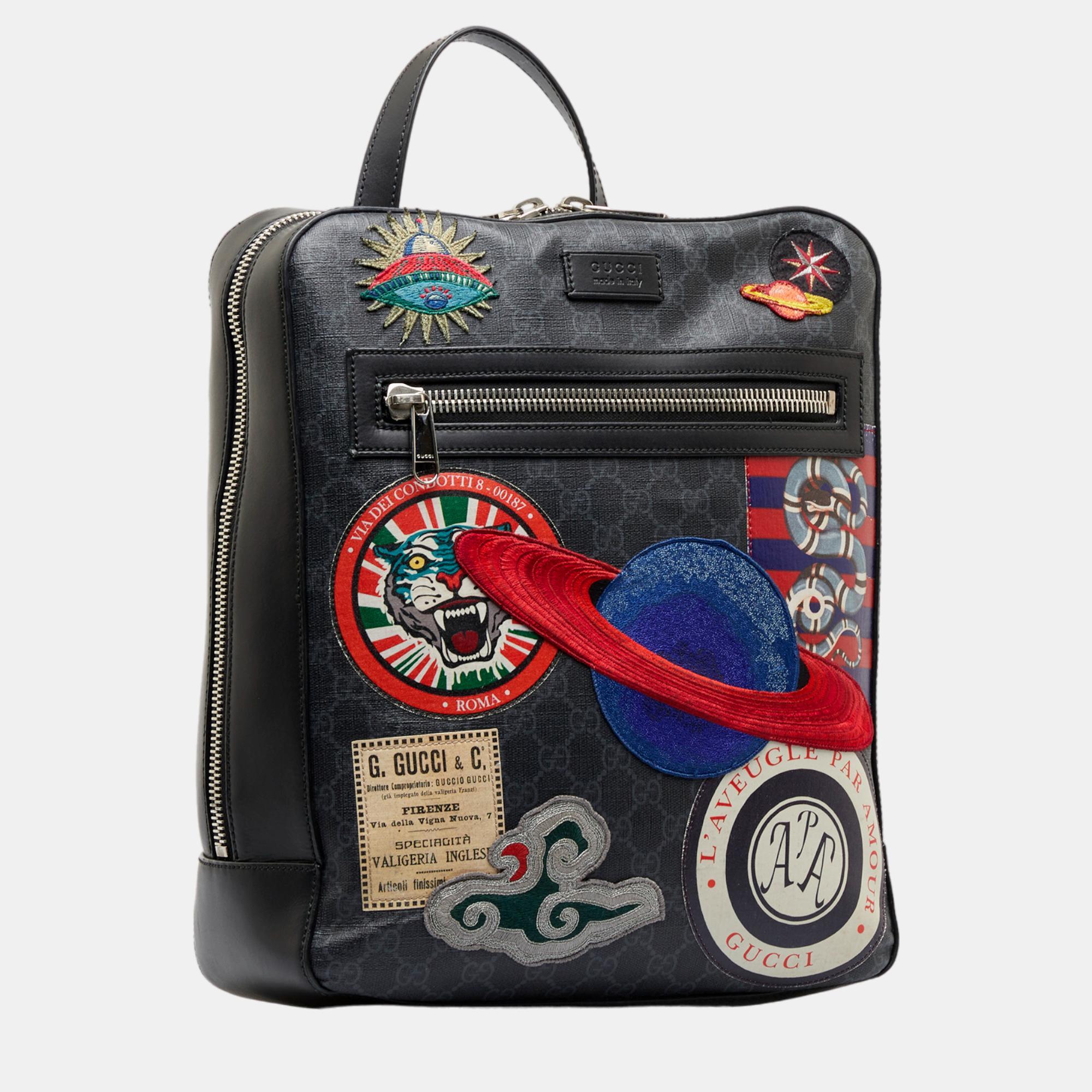 

Gucci Black GG Supreme Night Courrier Backpack