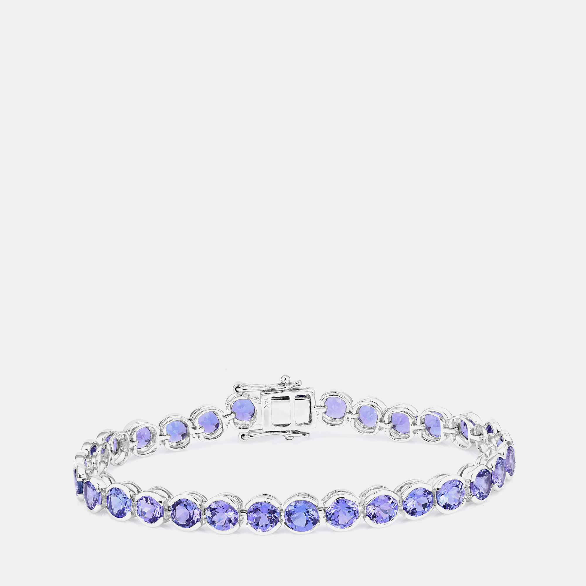 Click to view more detailed imagery on our partner's website Pre-owned Hautefacets 12.60 Cts Tanzanite 14k White Gold Tennis Bracelet