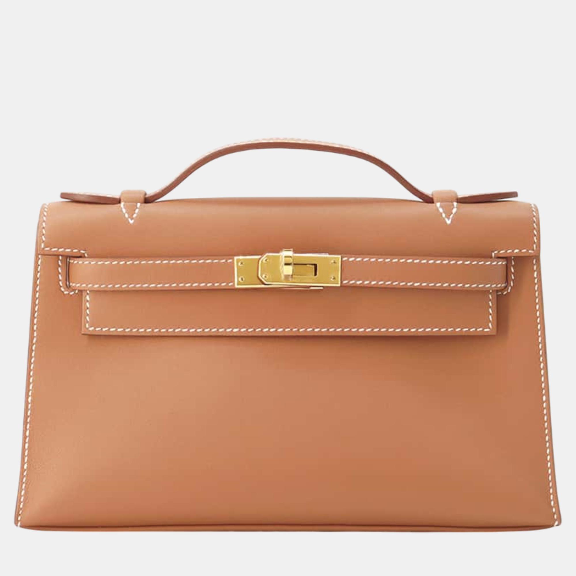 

Hermes Gold Swift Leather Pochette Kelly bag, Orange