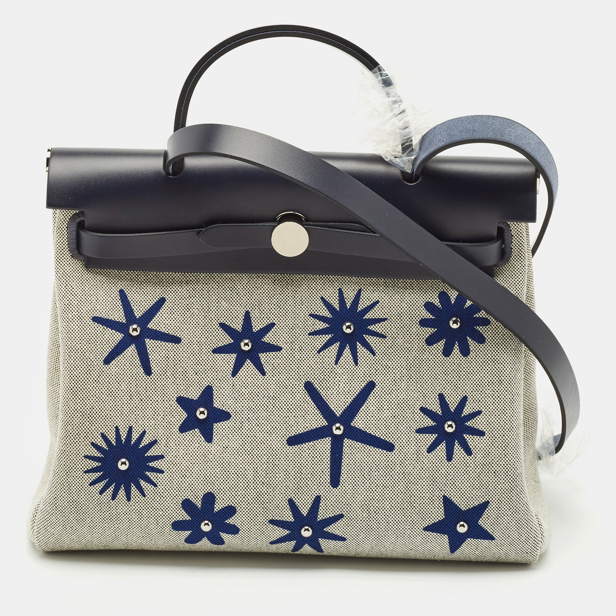 

Hermès Bleu Royal/Ecru/Indigo H Plume Toile and Vache Hunter Circuit Rider Hobnailed Herbag 31 Bag, Blue