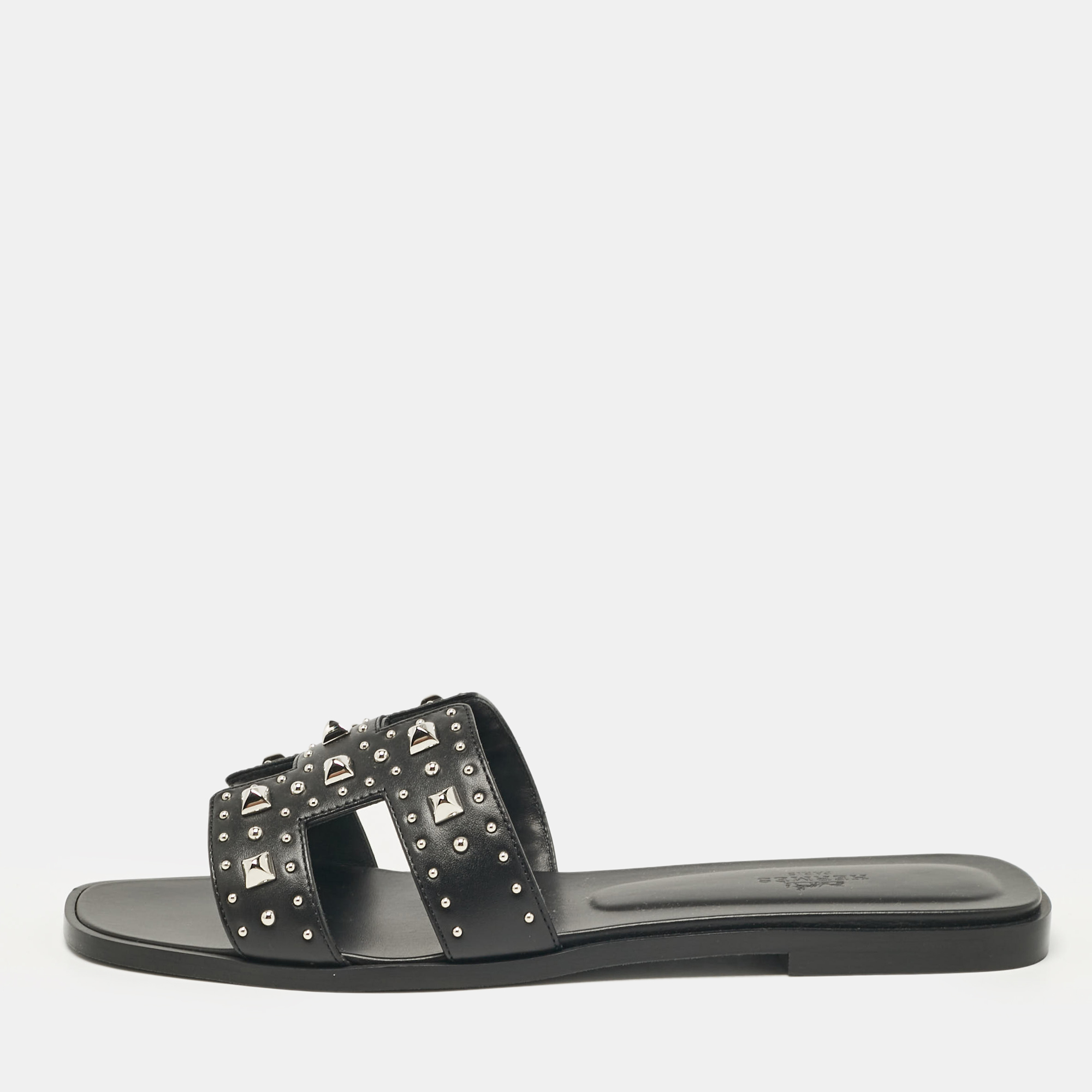 

Hermes Black Leather Studded Oran Flat Slides Size