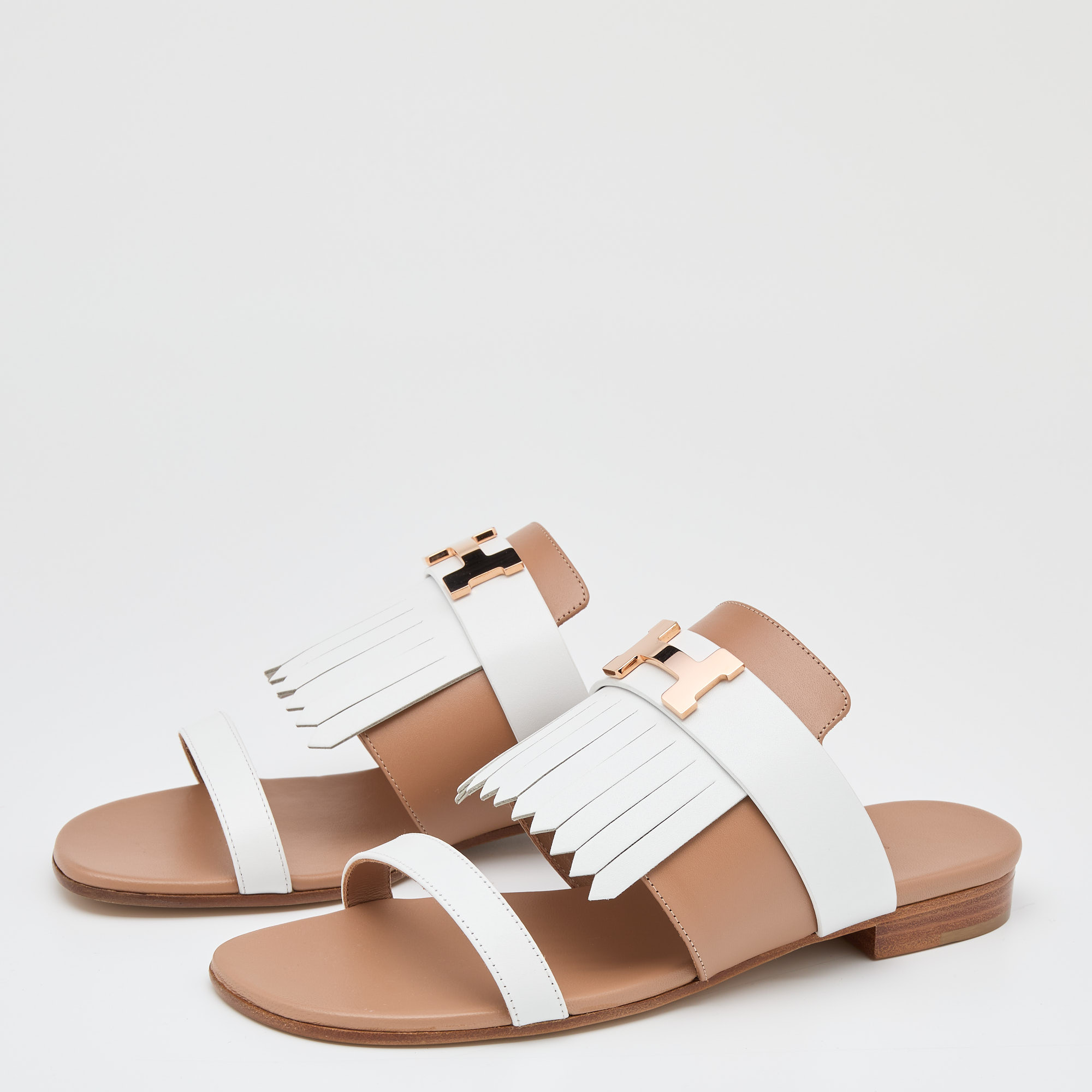 

Hermes Beige/White Leather Coralia Fringe Flats Size